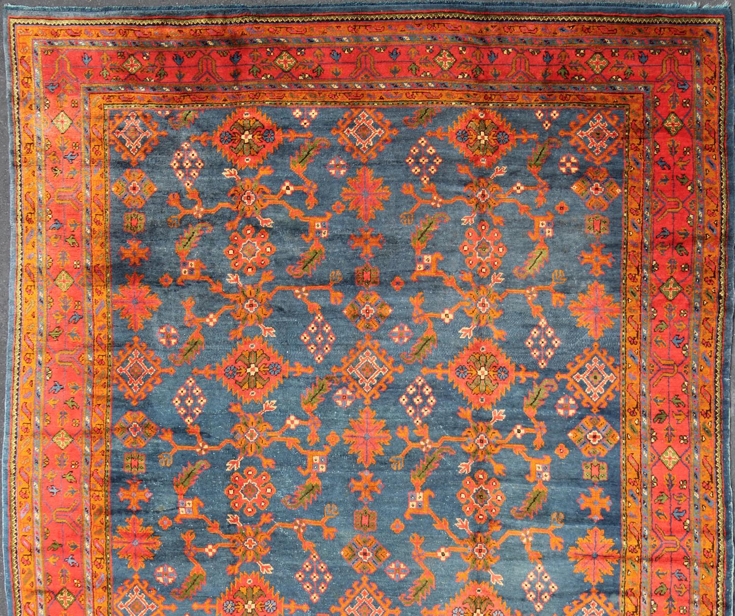 Hand-Knotted Antique Turkish Oushak Rug in Vibrant Blue, Red, Green with All-Over Design For Sale