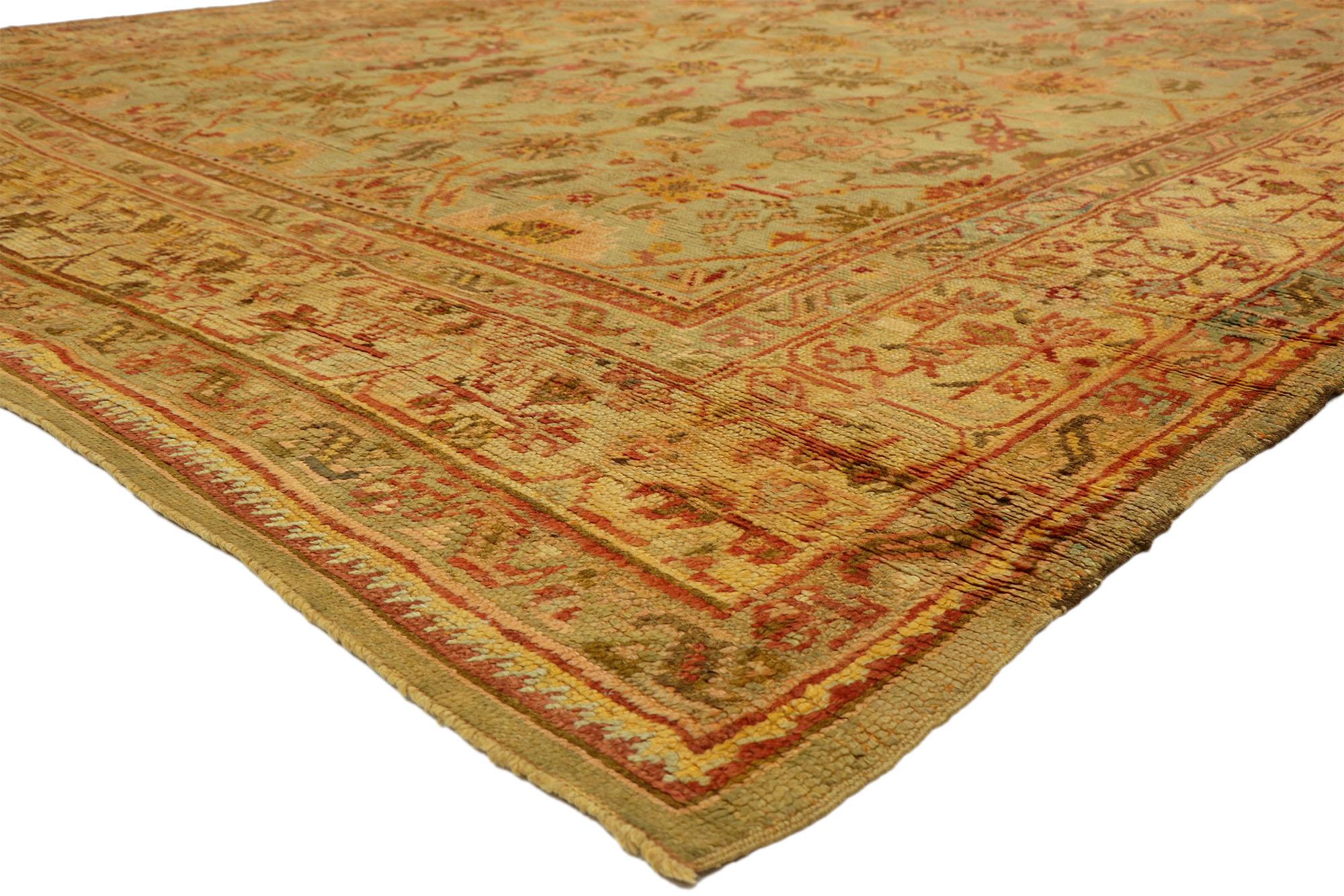 74175 Antique Turkish Oushak Rug, 10'05 x 14'03.
Italian Nonna Chic meets electic elegance in this hand knotted wool antique Turkish Oushak rug. The artisan details and sedimentary layers of color woven into this piece work together creating an