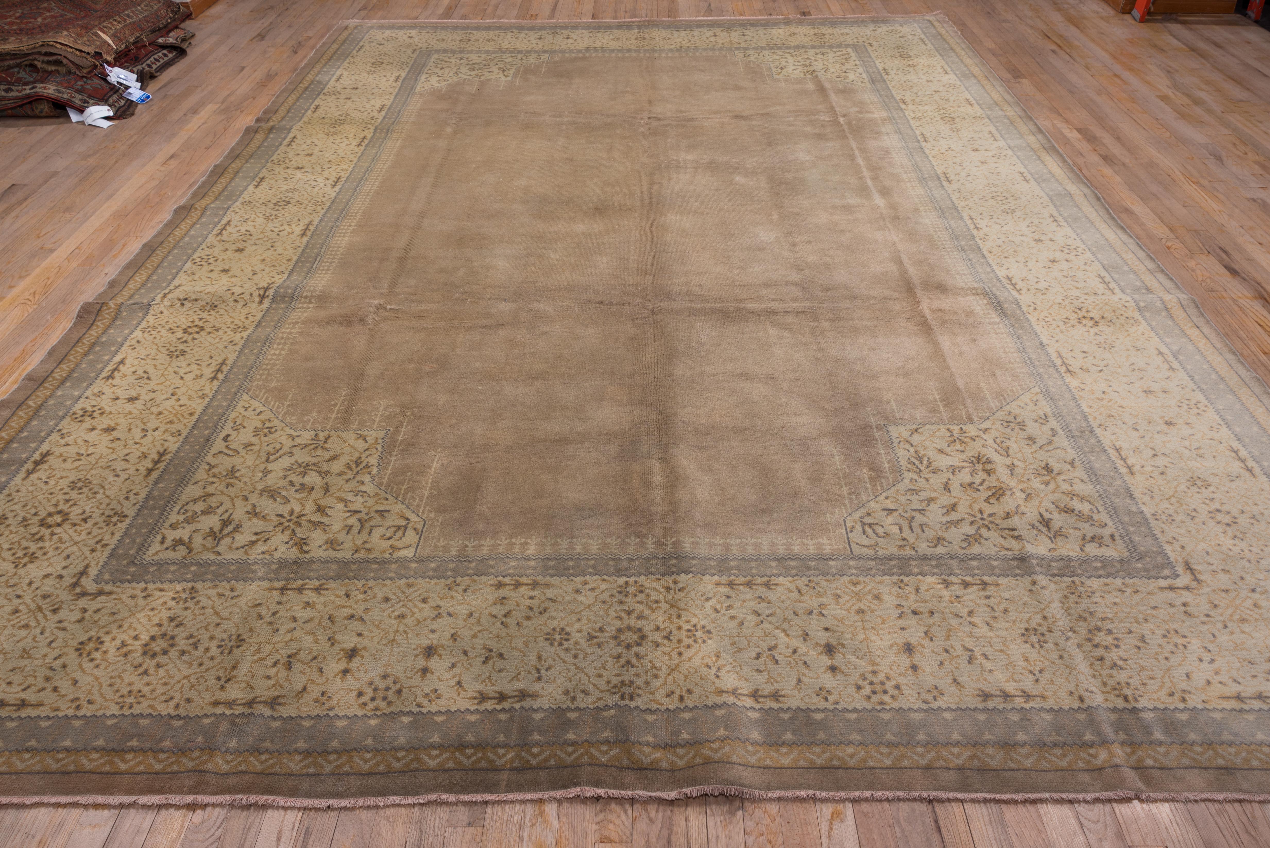 Antique Turkish Oushak Rug, Light Brown Open Field, circa 1920s In Good Condition For Sale In New York, NY