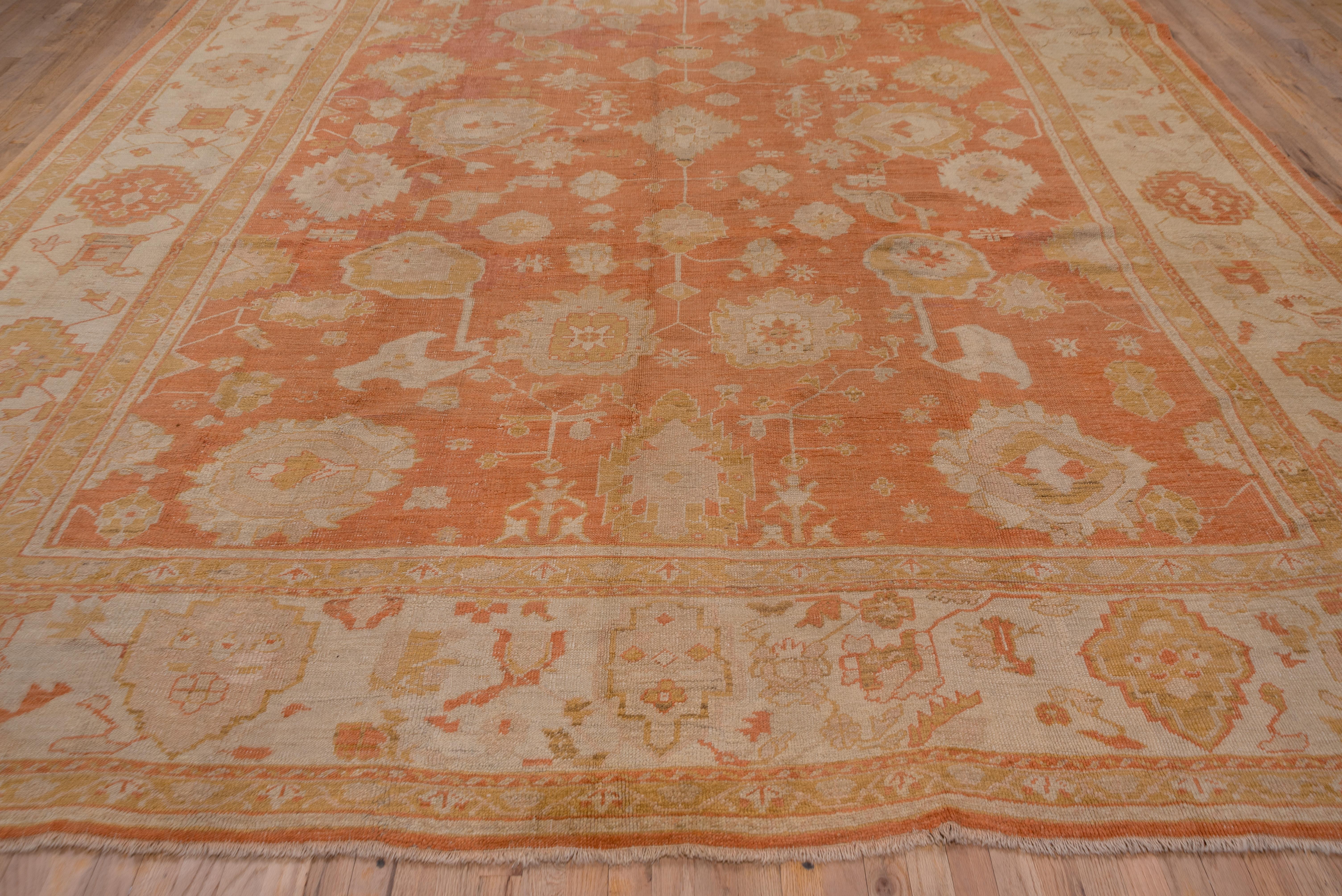 Hand-Knotted Antique Turkish Oushak Rug, Orange All-Over Field, Ivory Borders, circa 1900s For Sale