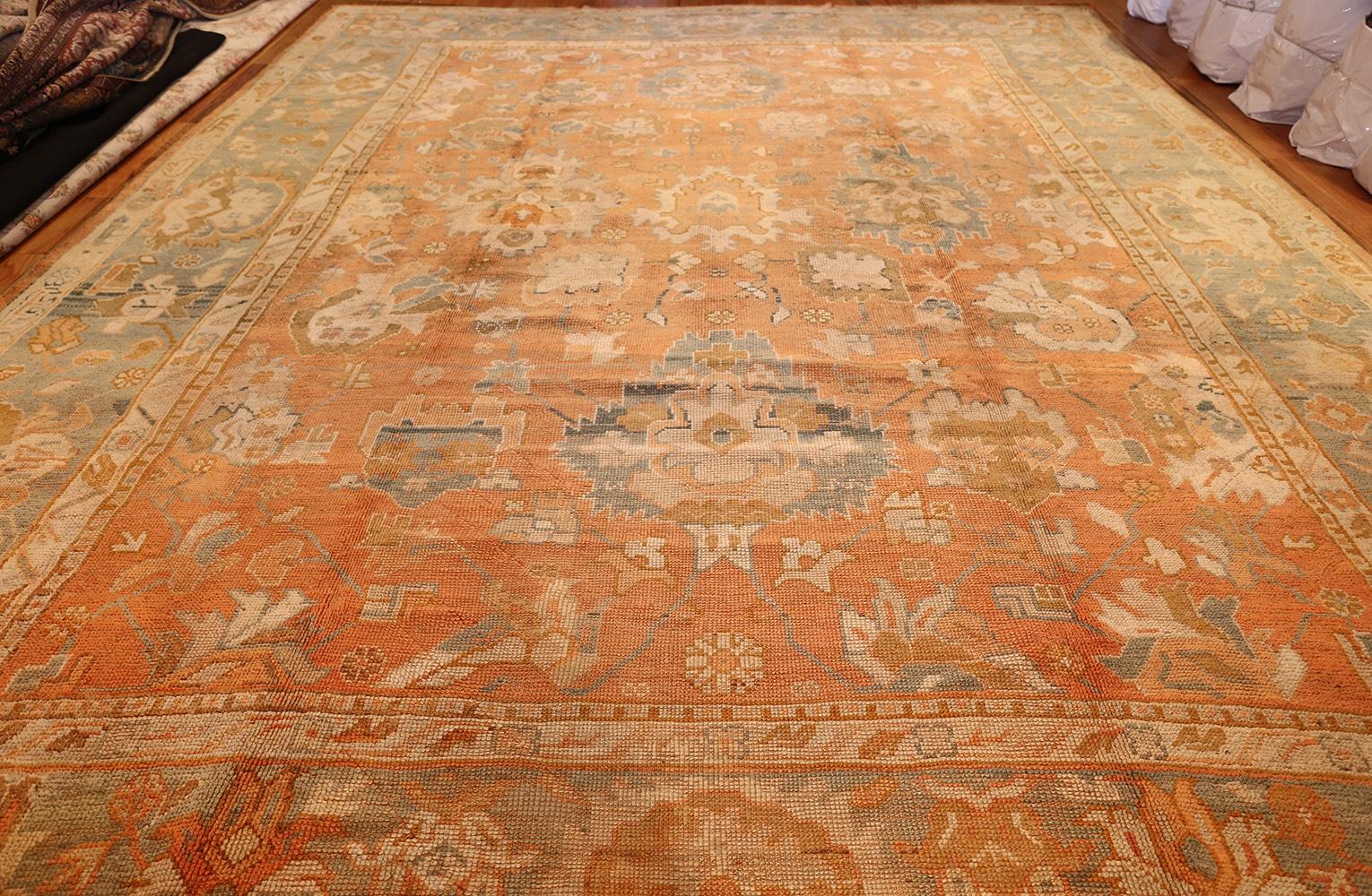 Antique Turkish Oushak rug, country of origin: Turkey, date circa early 20th century. Size: 11 ft. 7 in x 14 ft. 7 in (3.53 m x 4.44 m)

This rug is a wonderful example of Classic Oushak weaving with large, rectilinear motifs, soft colors and an