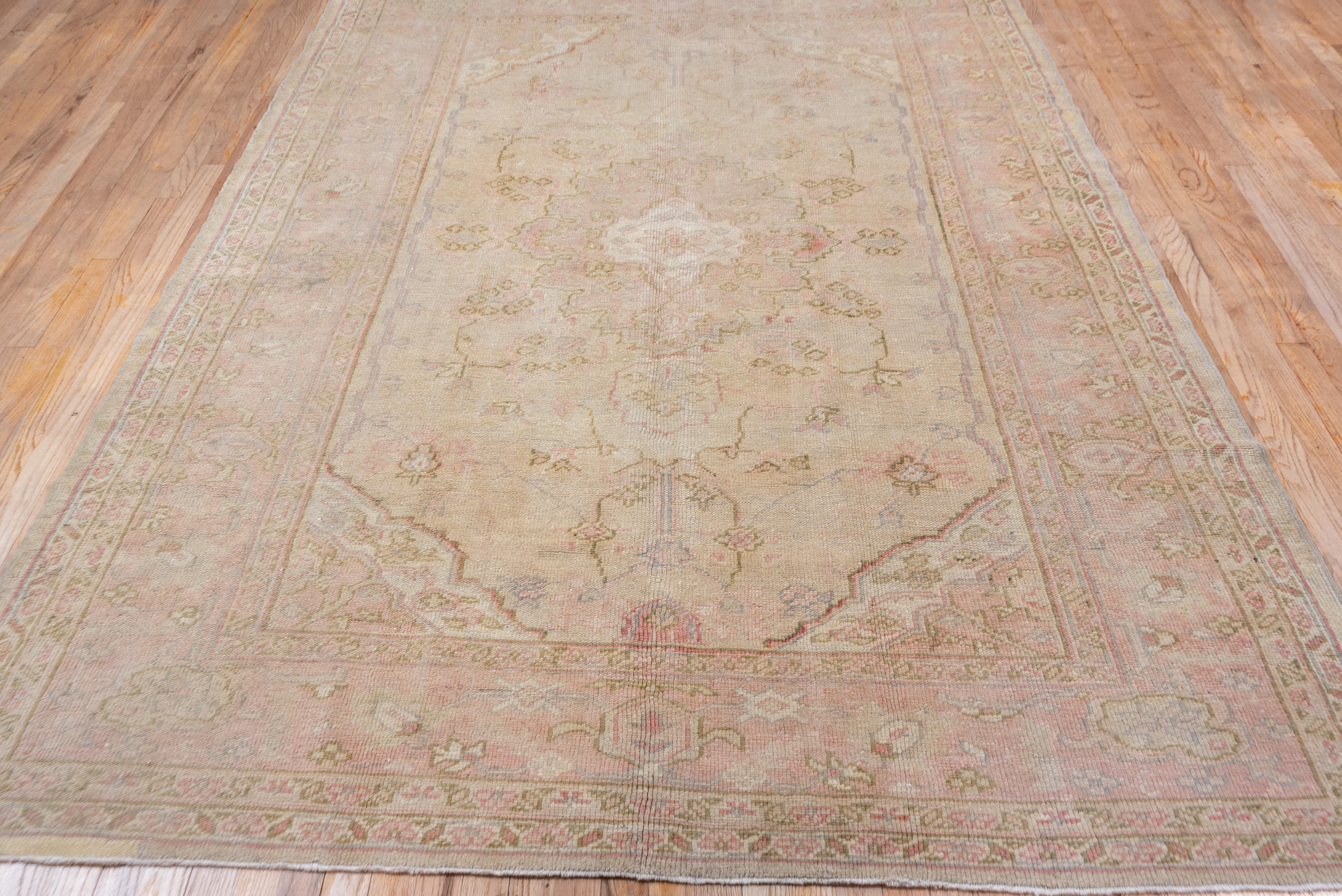 Mid-20th Century Antique Turkish Oushak Rug with a Soft Palette, Light Purple and Pink Tones For Sale