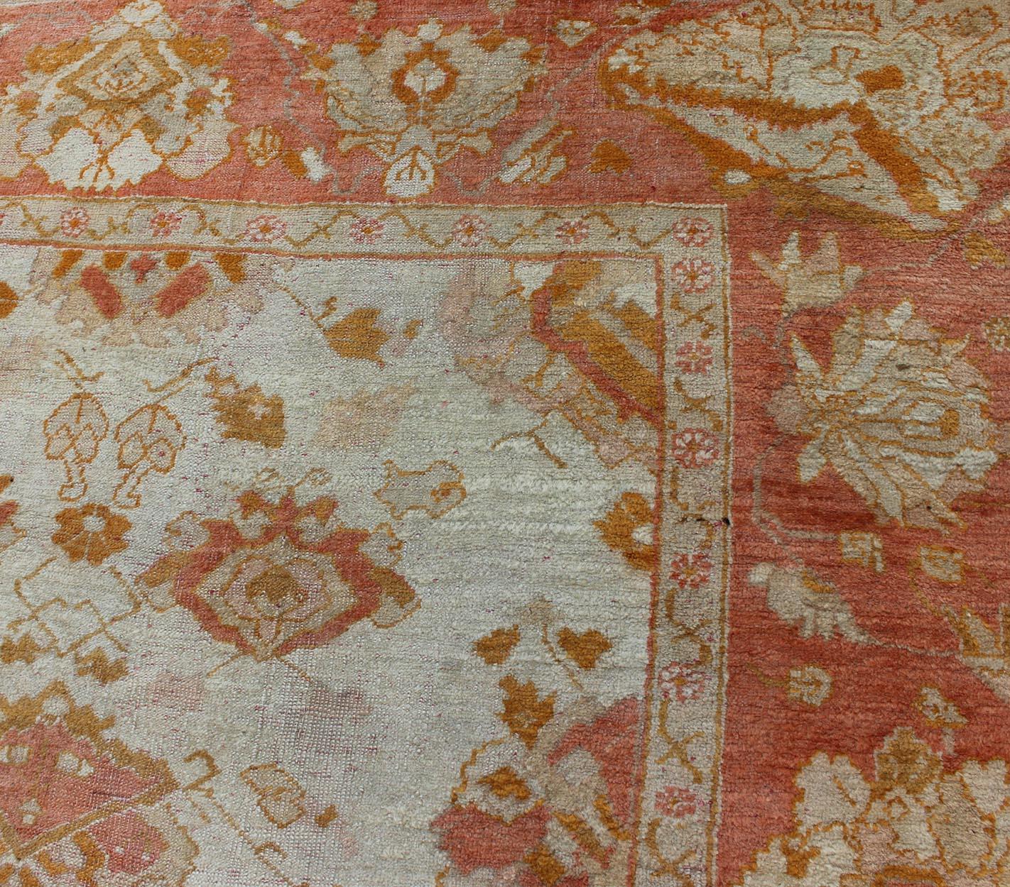 Antique Turkish Oushak Rug with All-Over Design in Ivory and Coral-Salmon In Good Condition For Sale In Atlanta, GA