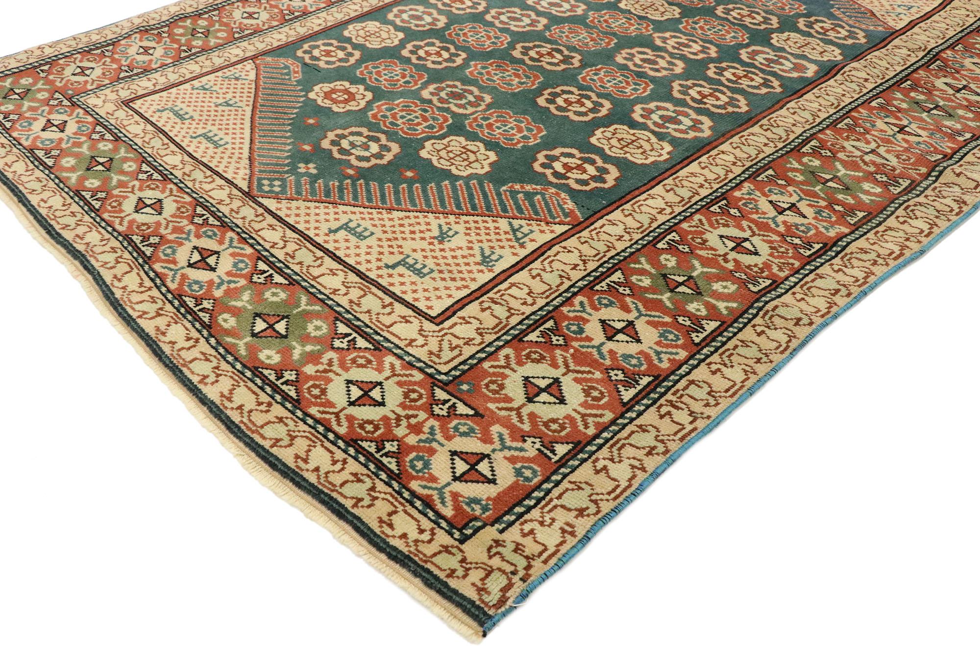 53042, antique Turkish Oushak rug with American Colonial styl. Displaying well-balanced symmetry with a simple design aesthetic, this hand knotted wool antique Turkish Oushak rug beautifully embodies American Colonial style. The elongated