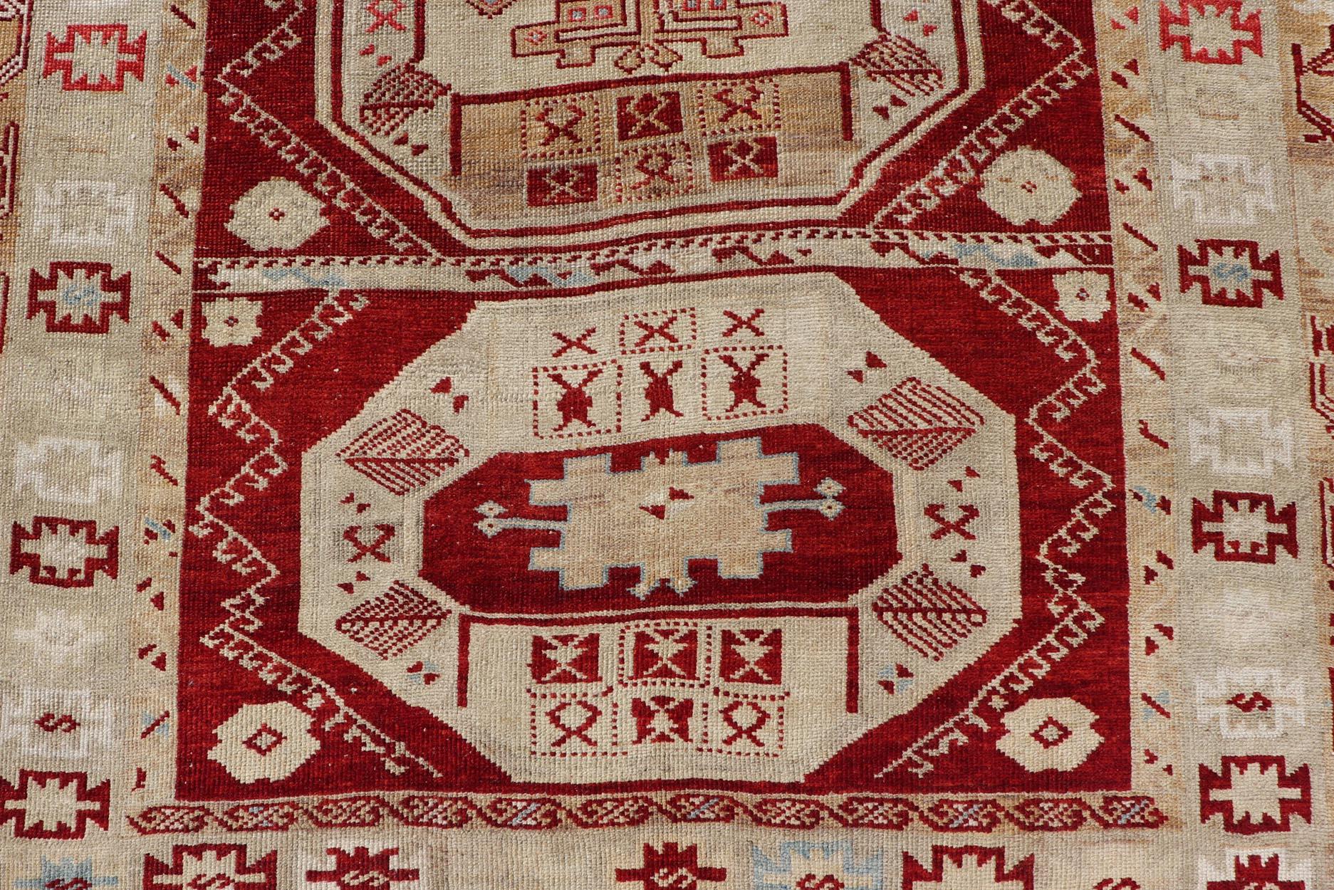 Hand-Knotted Antique Turkish Oushak Rug with Deep Red, Ivory Tones and Medallions 4'8 x 9'6 For Sale