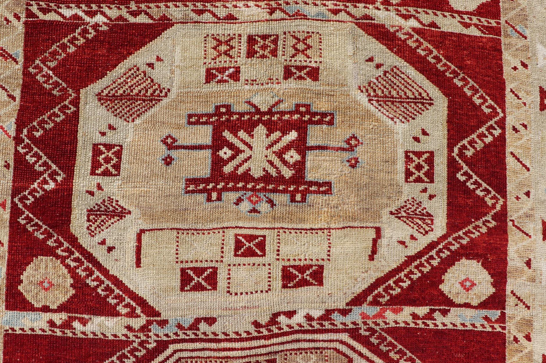 Antique Turkish Oushak Rug with Deep Red, Ivory Tones and Medallions 4'8 x 9'6 In Good Condition For Sale In Atlanta, GA