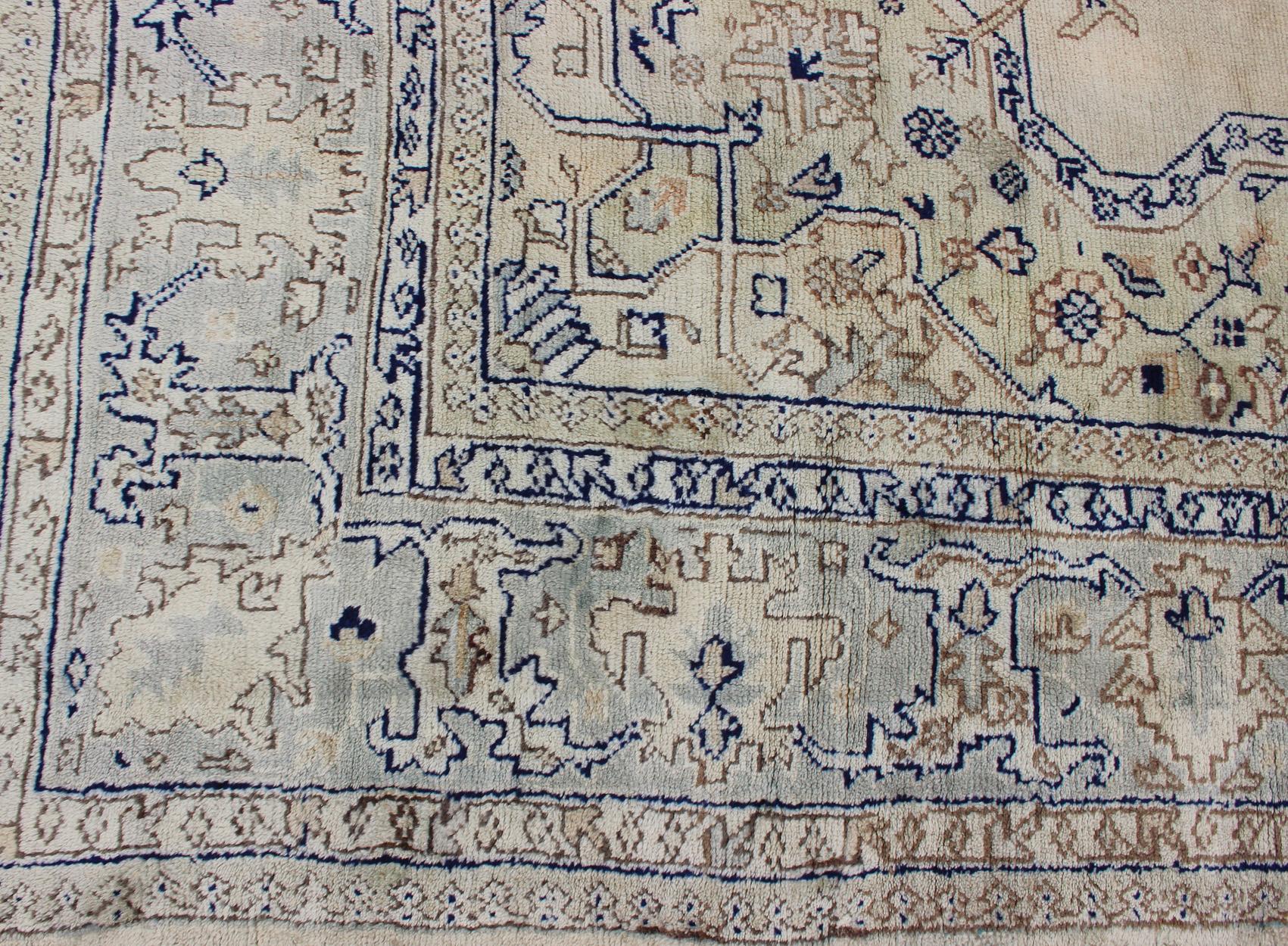 Antique Turkish Oushak with Geometric Motifs in Champagne Field and Accent Blue For Sale 9