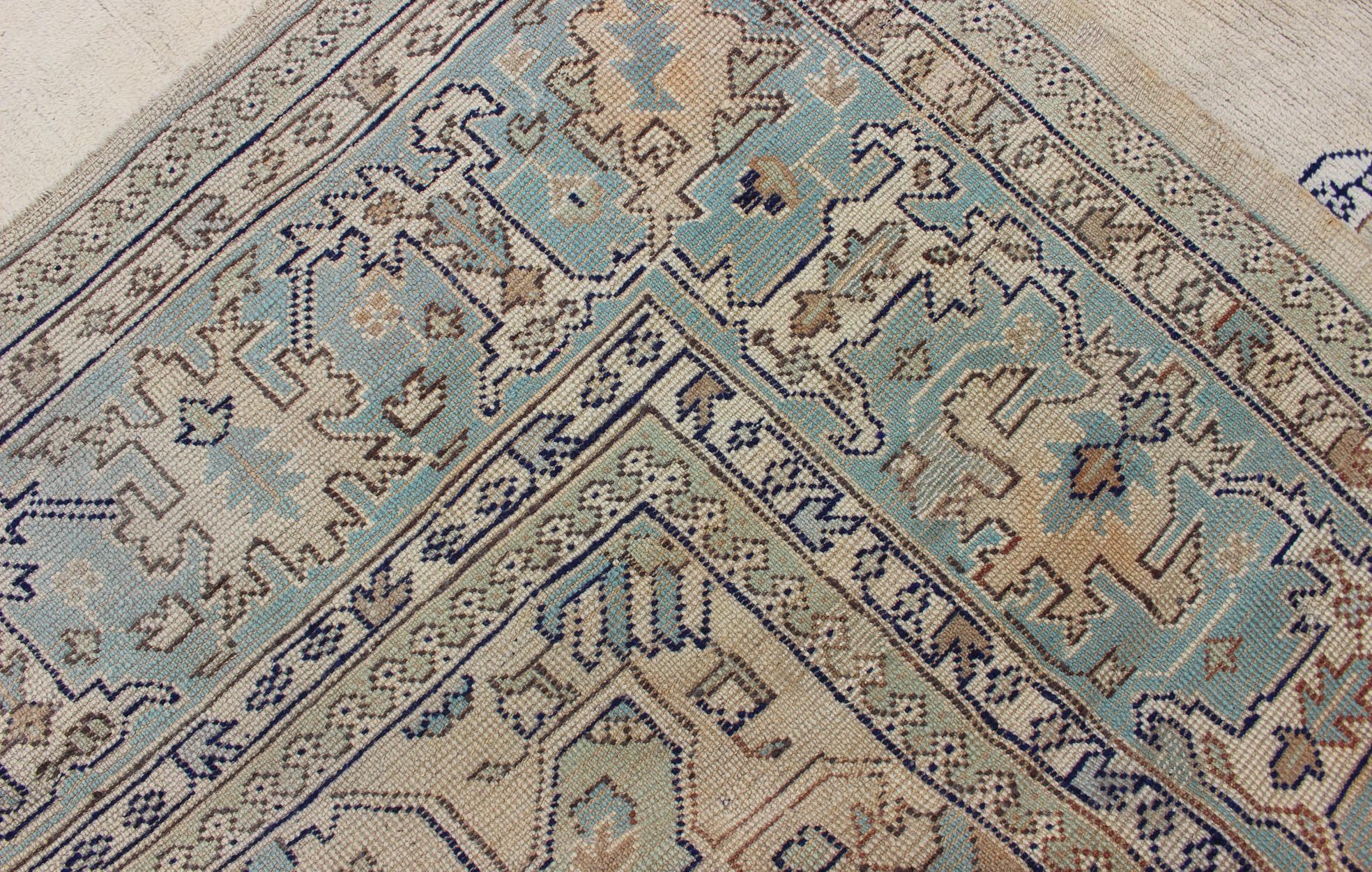 20th Century Antique Turkish Oushak with Geometric Motifs in Champagne Field and Accent Blue For Sale