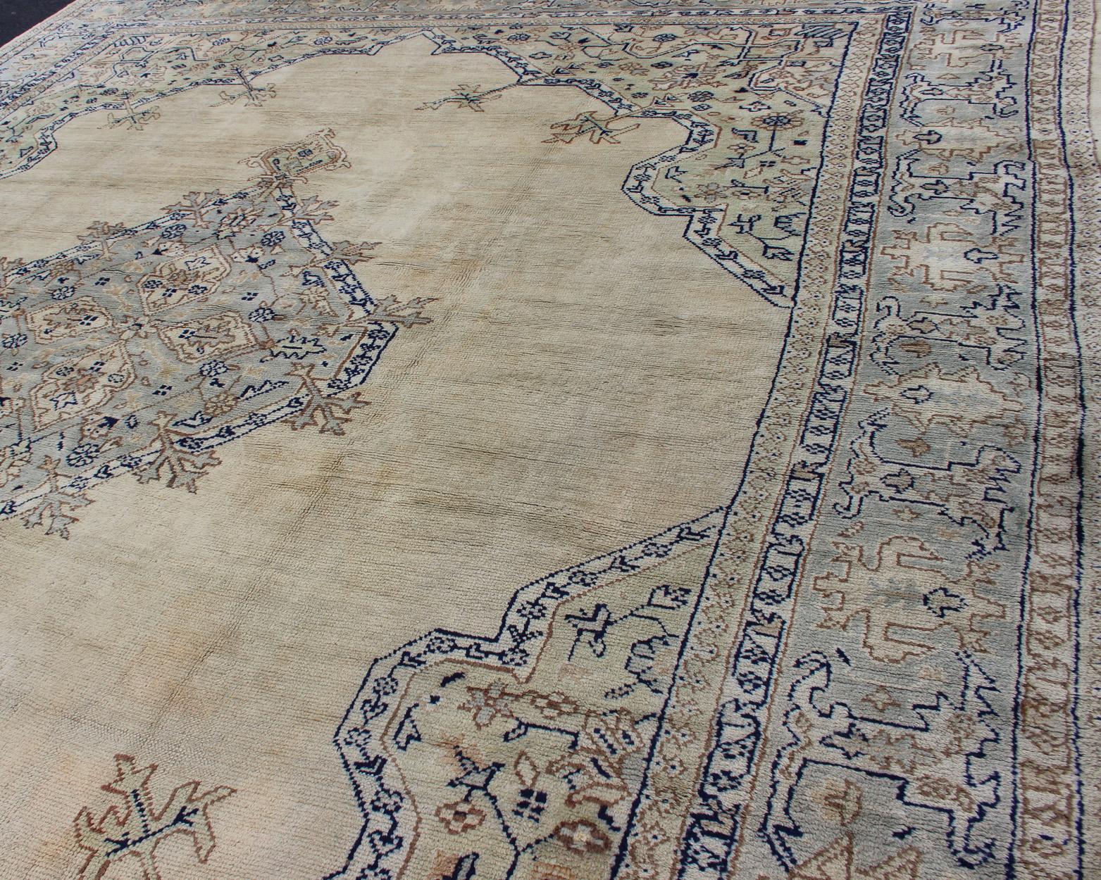 Antique Turkish Oushak with Geometric Motifs in Champagne Field and Accent Blue For Sale 1