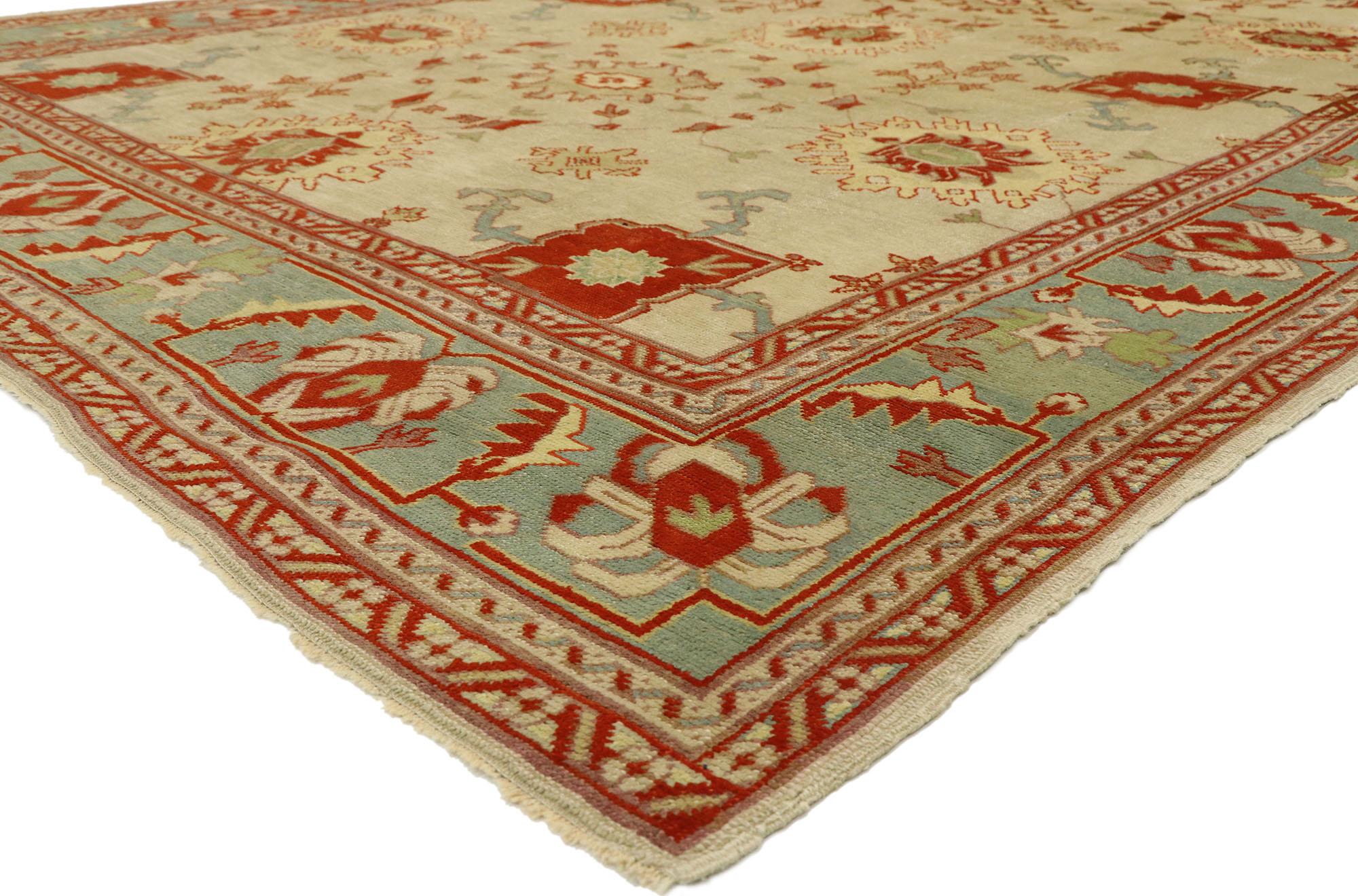 73883 Antique Turkish Oushak Rug with Mediterranean Style 09'00 X 12'02. Showcasing a timeless design and beguiling beauty, this hand knotted wool antique Turkish Oushak rug imparts a sense of warmth and welcomed informality. It features an all-over