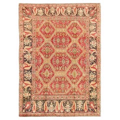 Tapis turc ancien d'Oushak avec bordure à motif cachemire et sur tout le pourtour motif tribal