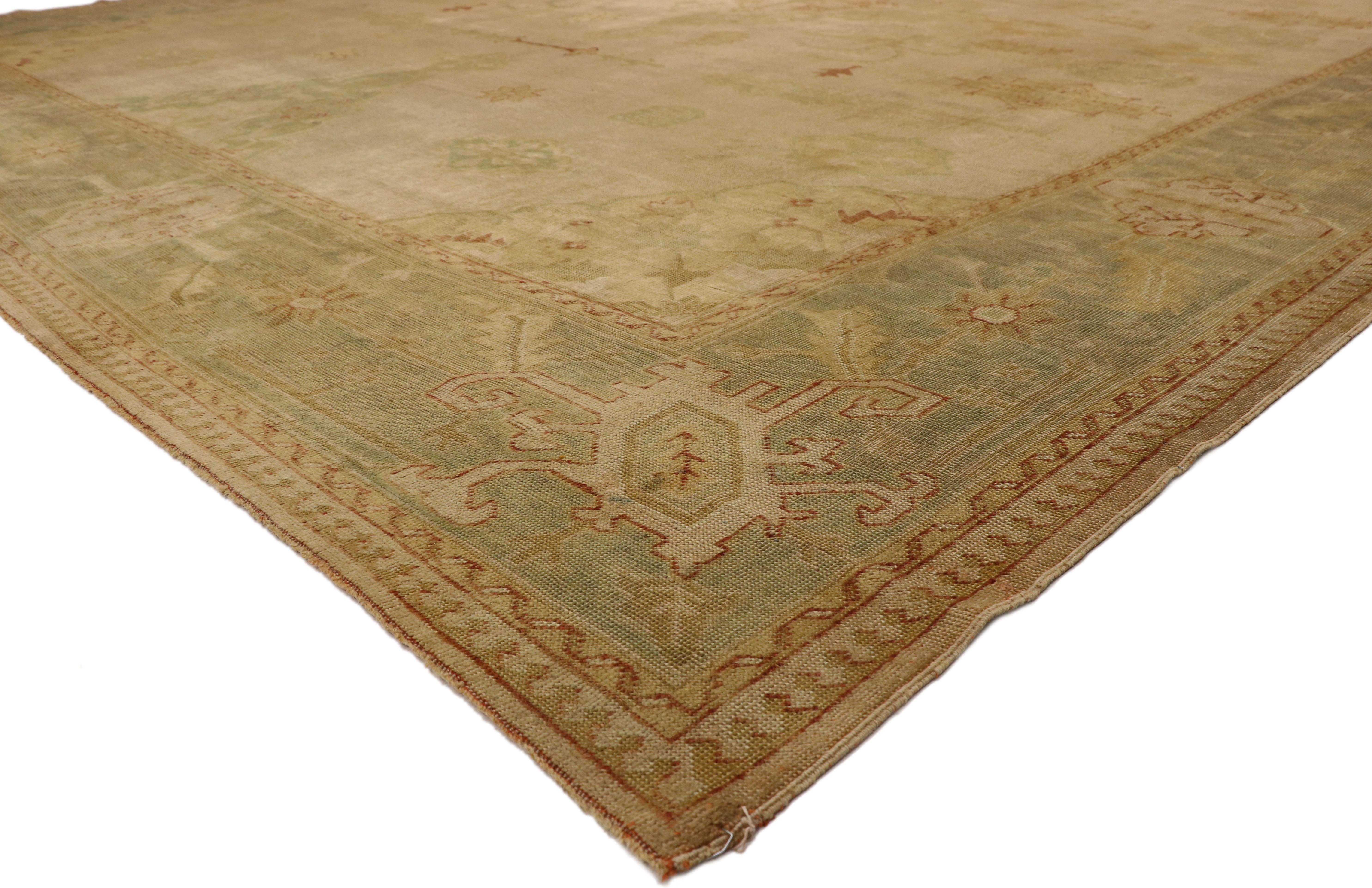 74842 Antique Turkish Oushak Rug 13'10 x 17'07. Effortless beauty with rustic sensibility, this hand-knotted wool antique Turkish Oushak rug imparts a sense of warmth and welcomed informality. Taking center stage is a cusped lozenge medallion