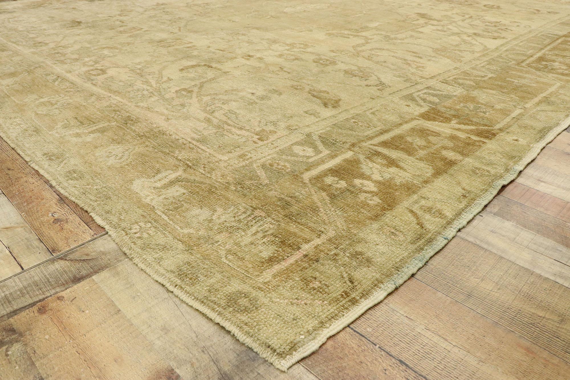 20th Century Antique Turkish Oushak Rug with Rustic French Cottage Style For Sale