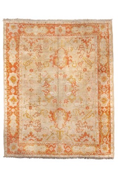 Antique Turkish Oushak Rug with Soft Apricot Field and Stylized Floral Motifs
