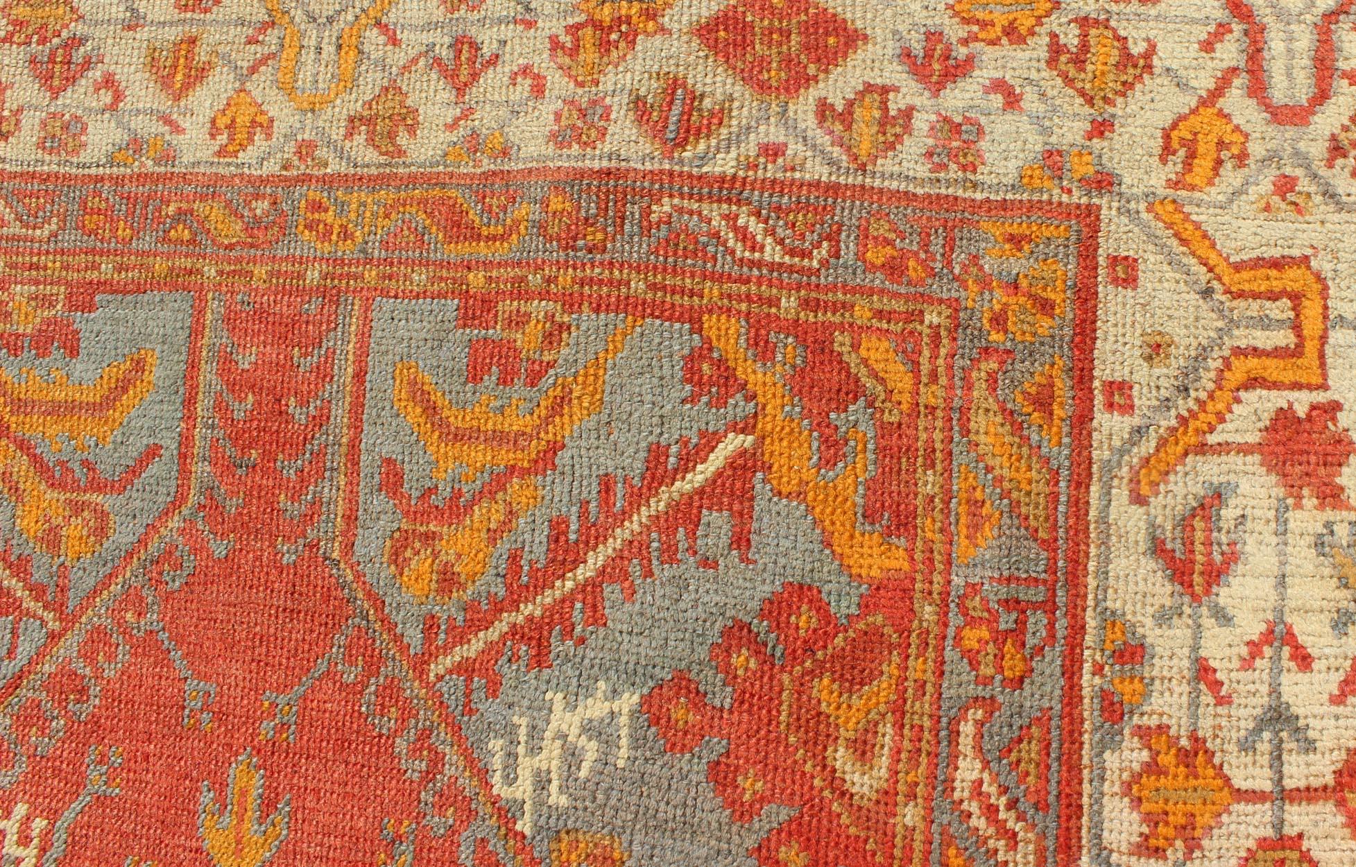 Antique Turkish Oushak Rug with Tribal Medallion Design in Terracotta and Blue For Sale 2