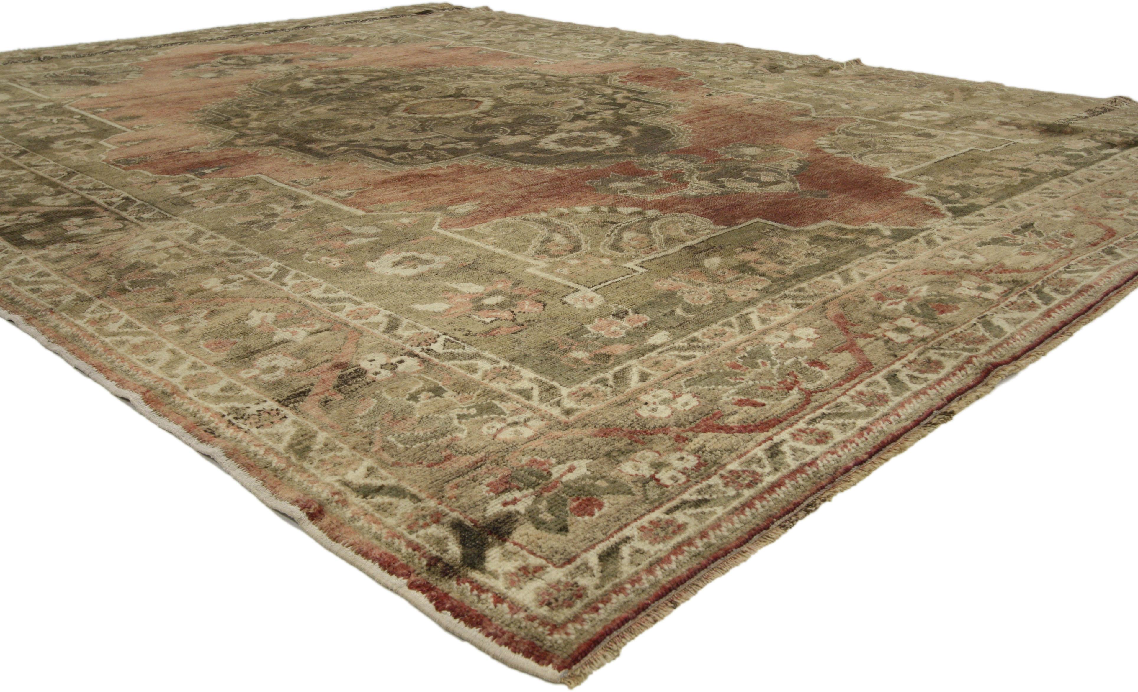 50934, antique Turkish Oushak rug with warm rustic Artisan style. This hand knotted wool vintage Turkish Oushak rug embodies a rustic Artisan style. Immersed in Anatolian history and warm colors, this vintage Oushak rug features a center medallion