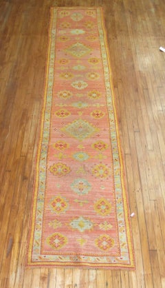 Antique Turkish Oushak Runner in Corals and Pink