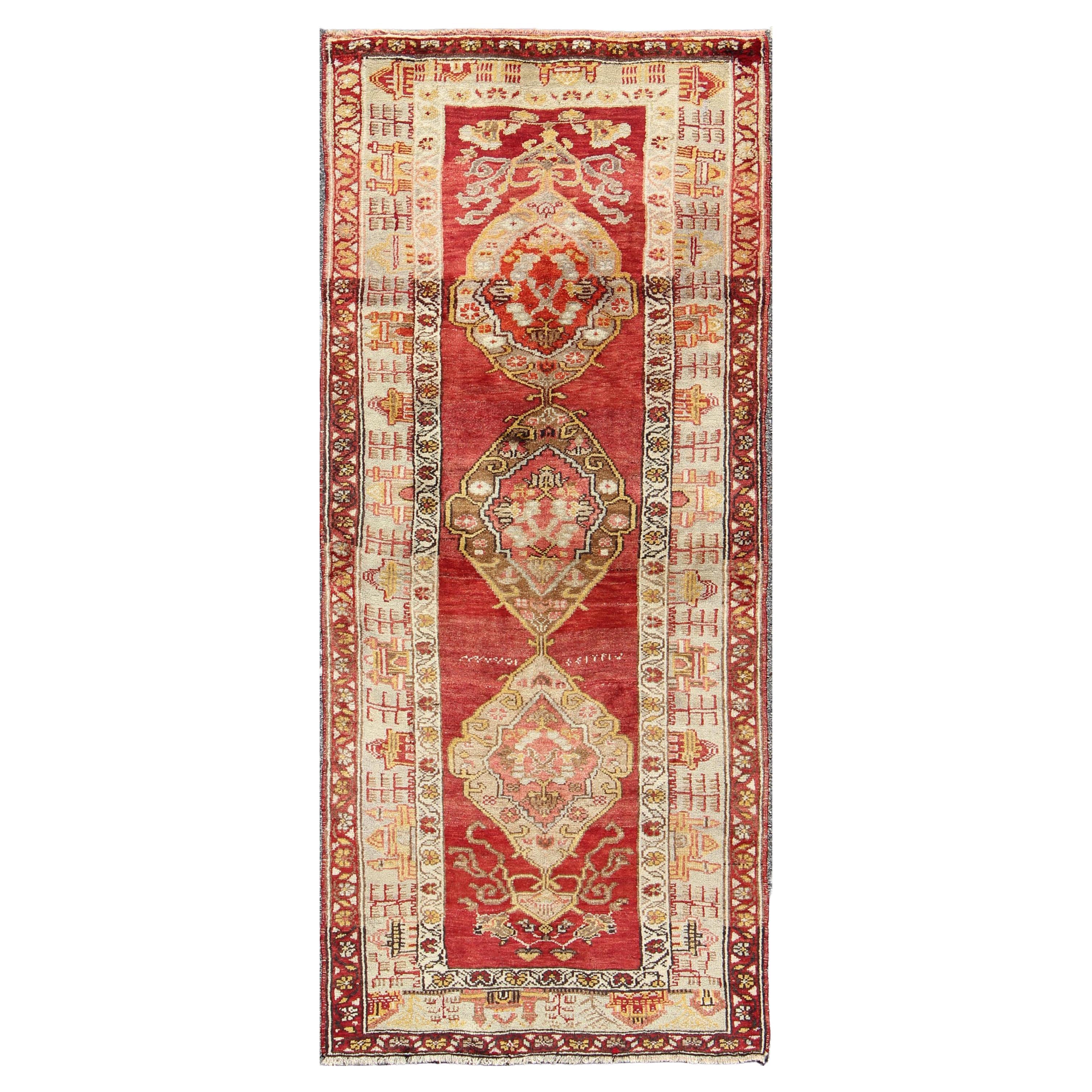 Antique Turkish Oushak Runner In Red Background with Neutral Medallions For Sale