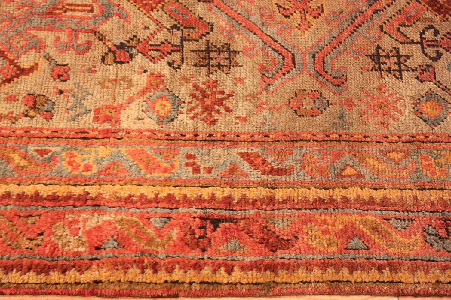 A beautifully decorative and warm antique Turkish Oushak runner rug, country of origin / rug type: antique Turkish rug, date: circa 1900. Size: 4 ft 5 in x 21 ft 3 in (1.35 m x 6.48 m).