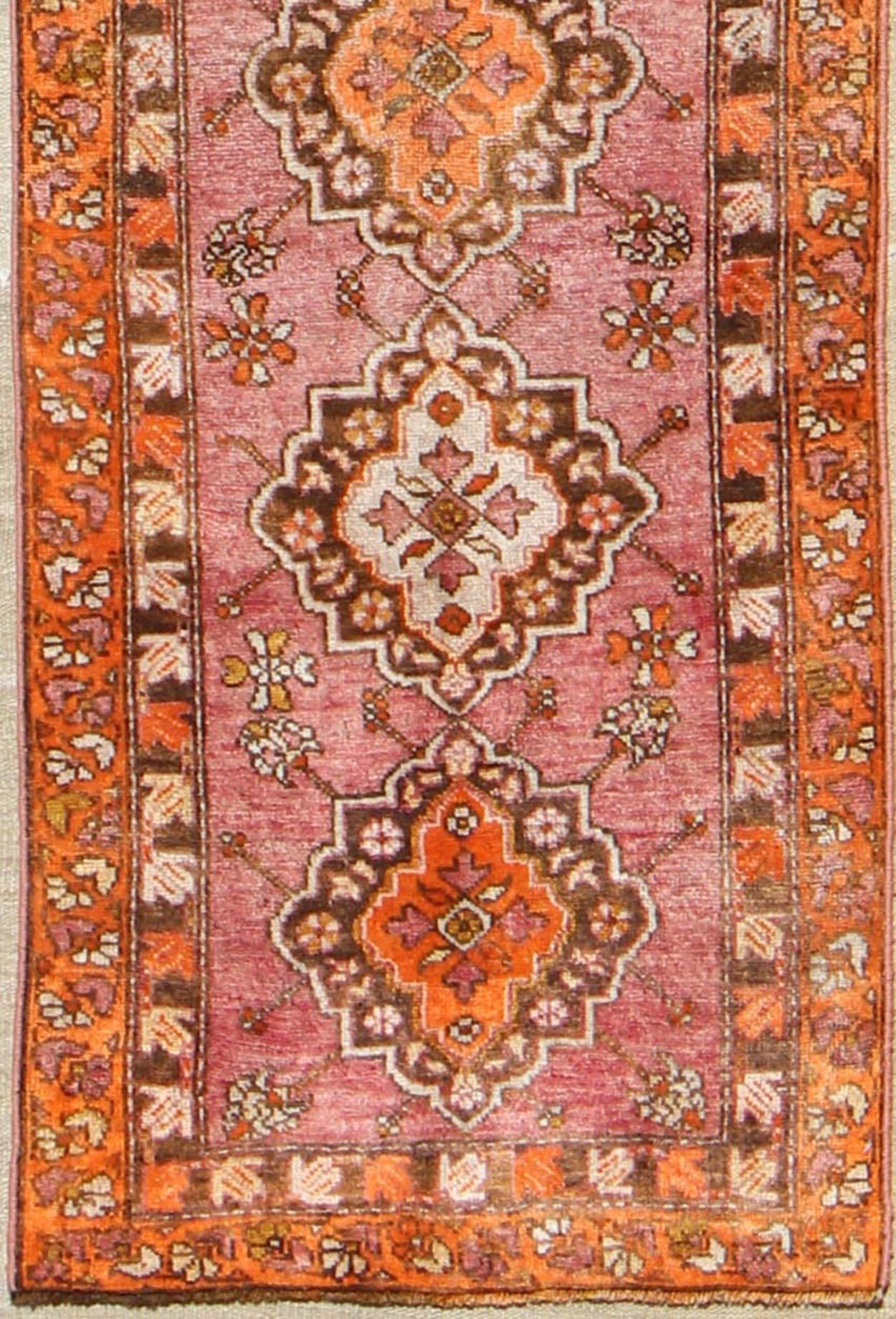 Antique Turkish Oushak runner with layered floral medallions and ornate borders, rug st-242, country of origin / type: Turkey / Oushak, circa 1930

This beautiful antique Oushak runner from 1930s Turkey features a Classic Oushak design, which is