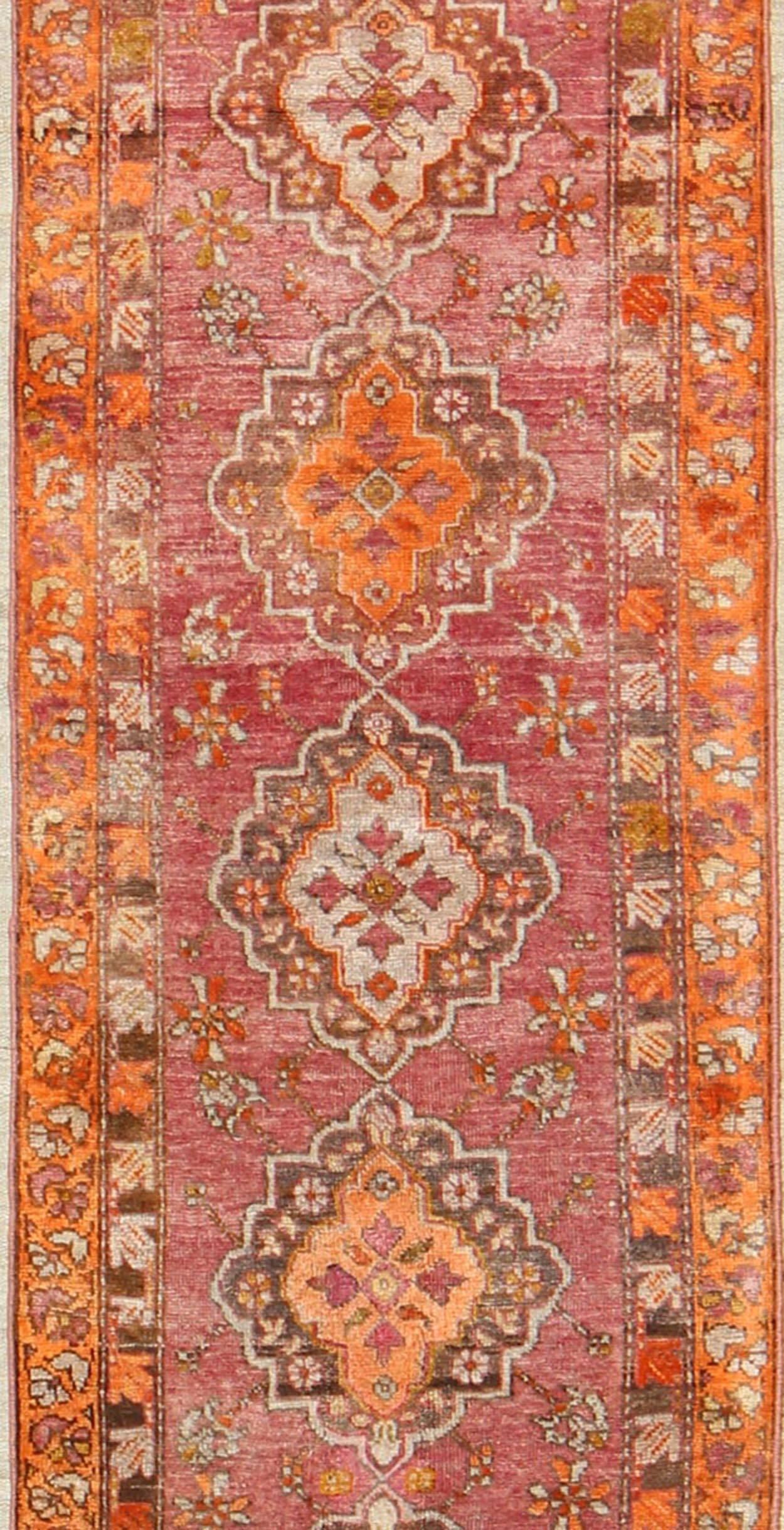 Antique Turkish Oushak Runner with Layered Floral Medallions and Ornate Borders In Excellent Condition For Sale In Atlanta, GA