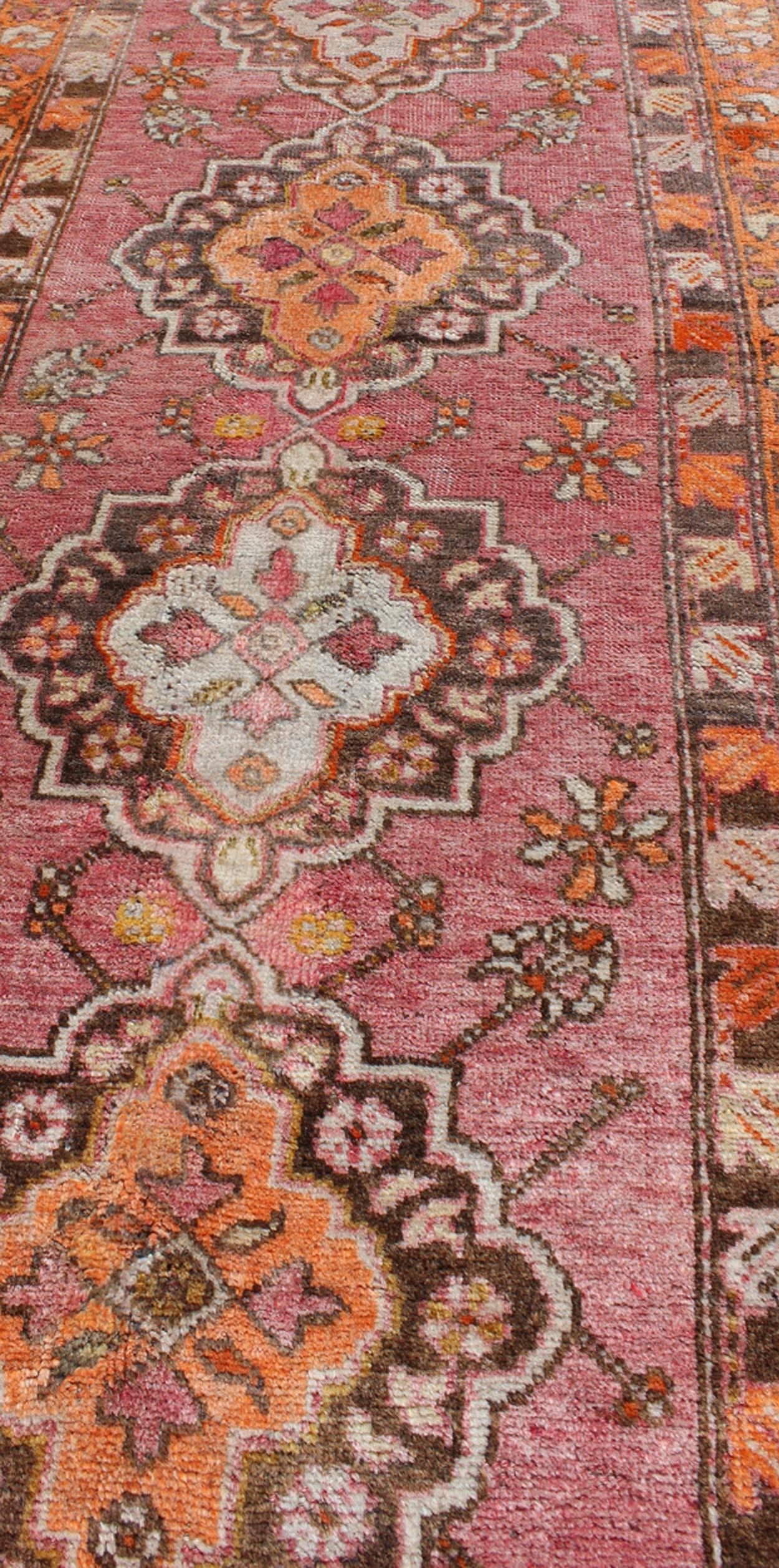 Mid-20th Century Antique Turkish Oushak Runner with Layered Floral Medallions and Ornate Borders For Sale