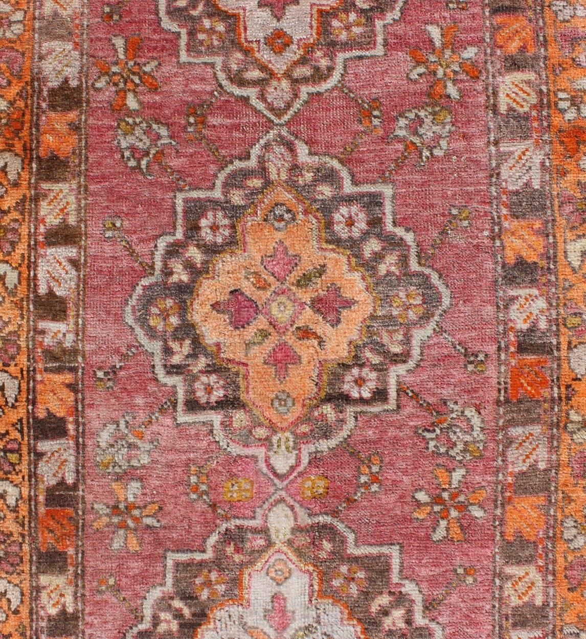 Wool Antique Turkish Oushak Runner with Layered Floral Medallions and Ornate Borders For Sale