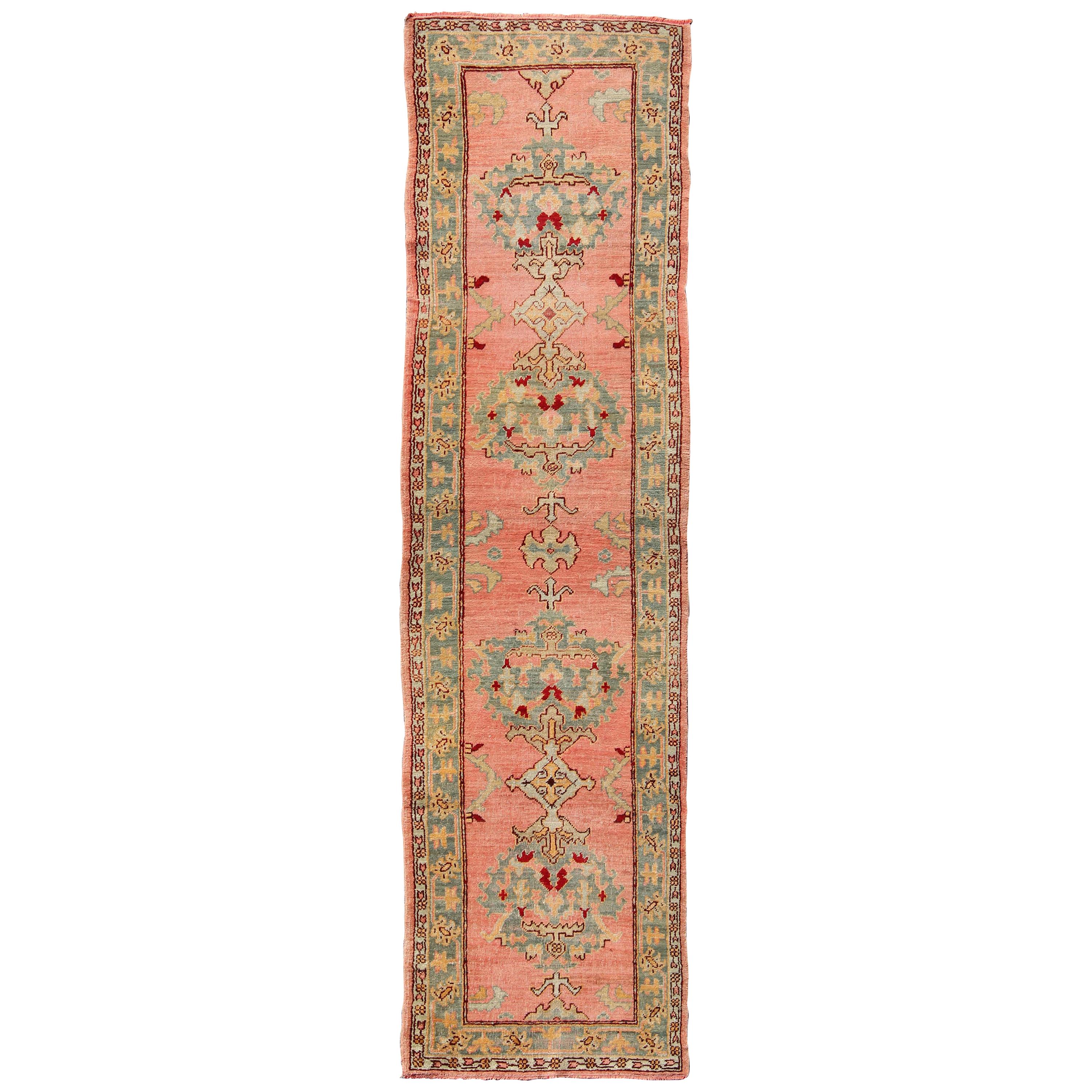 Antique Turkish Oushak Runner with Medallions in Coral Background & Green Border For Sale