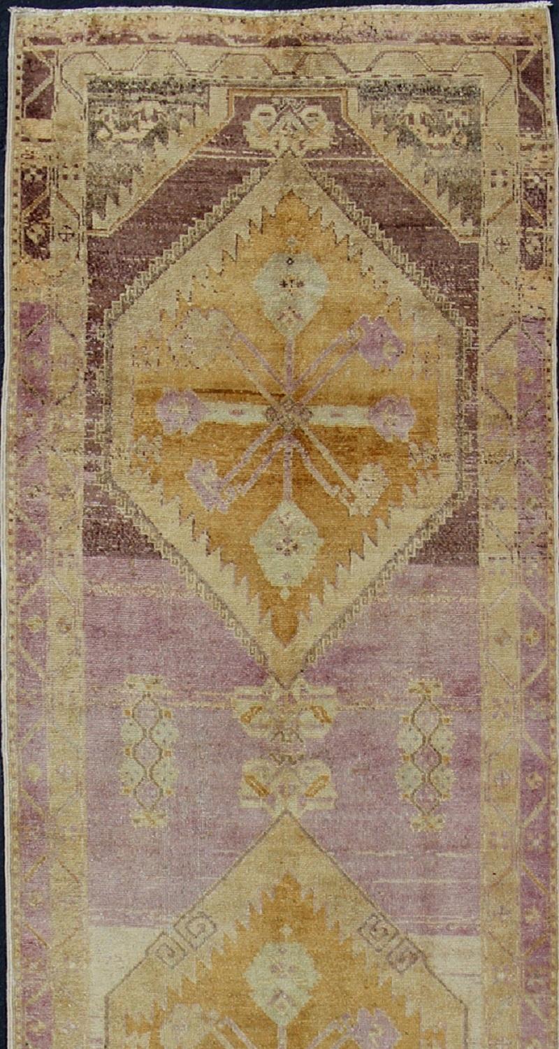 Antique Turkish Oushak Runner with Three Geometric Medallions in Purple Tones In Excellent Condition For Sale In Atlanta, GA