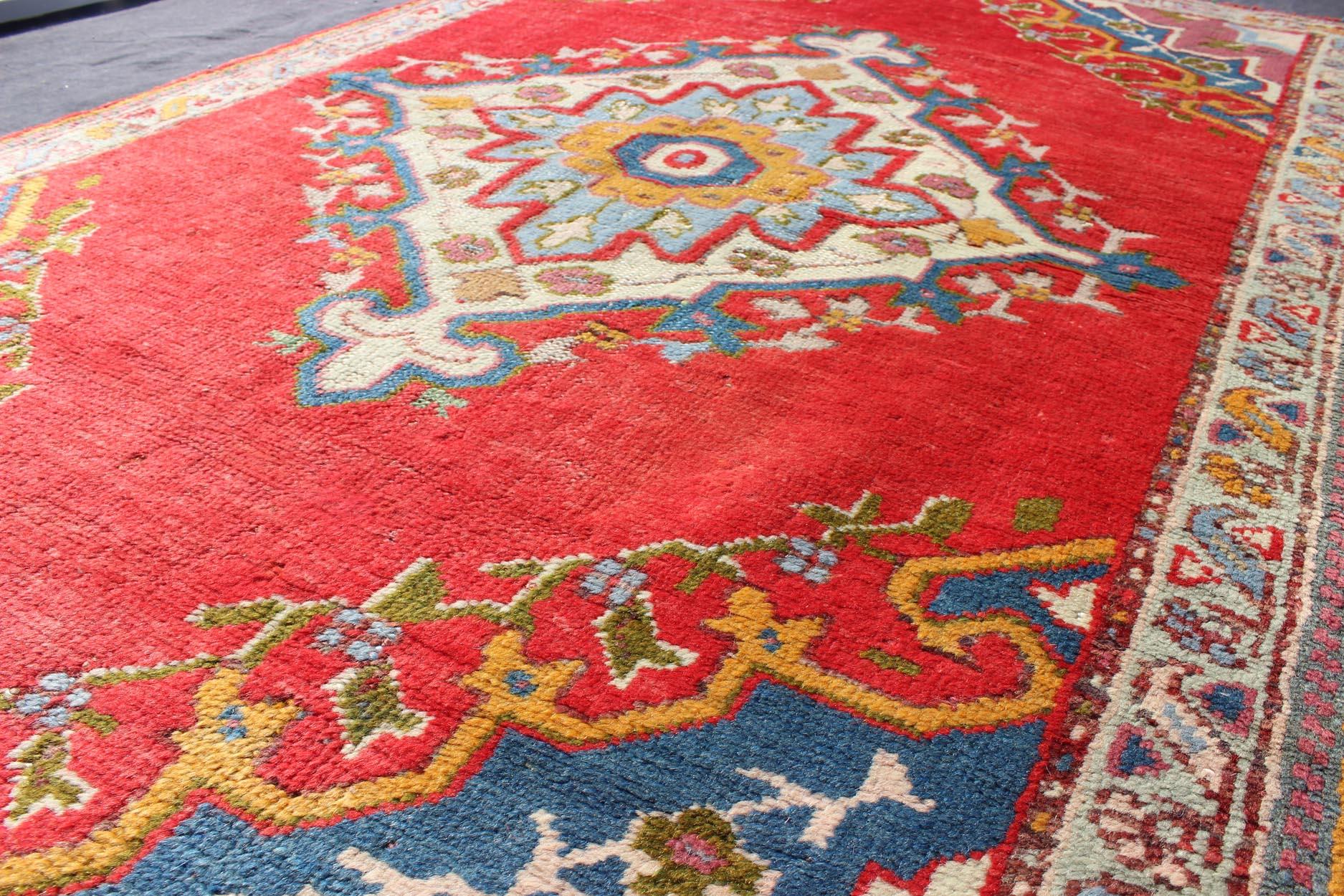 Early 20th Century Antique Turkish Oushak Small Rug in Red, Blue, Lavender, Orange & Green For Sale