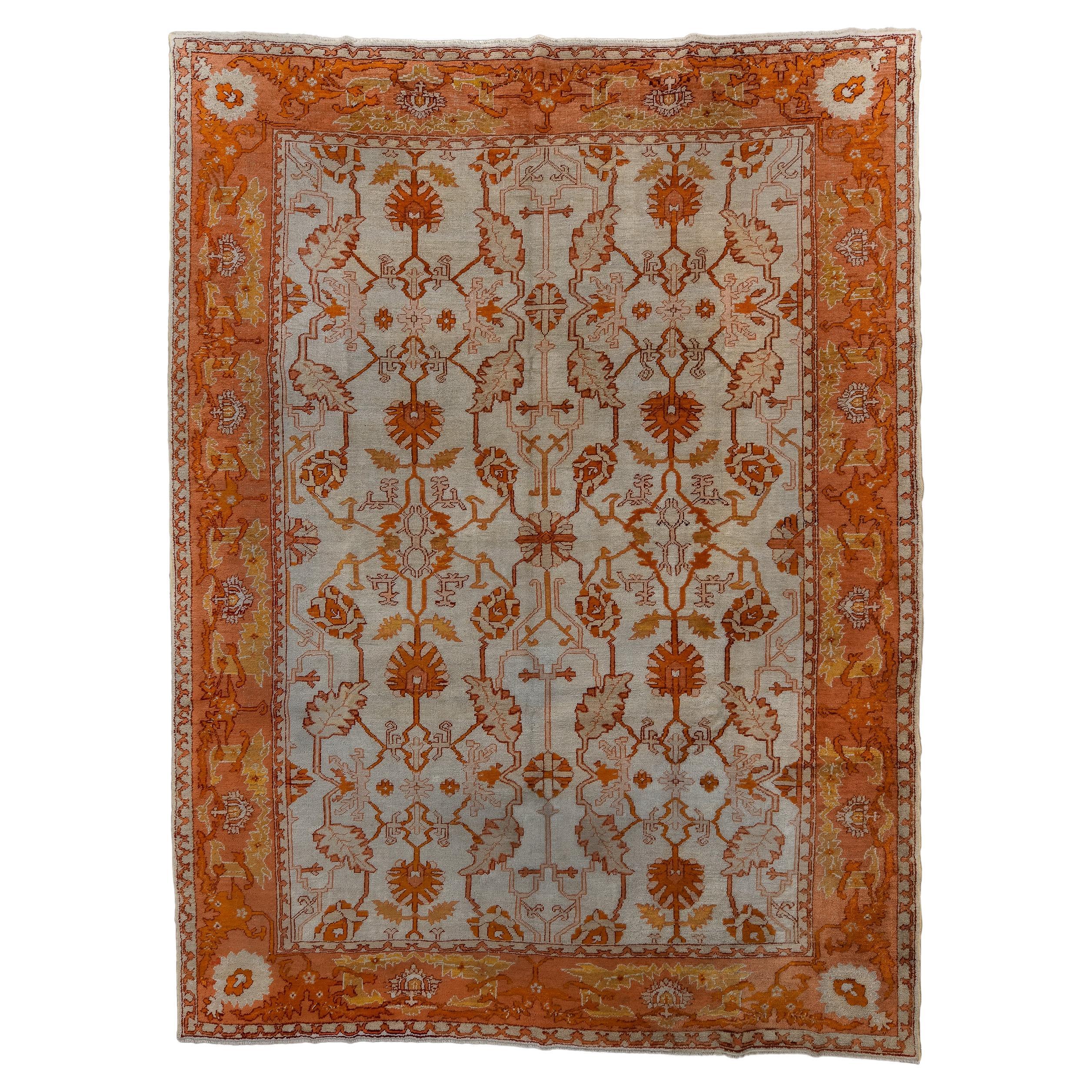 Antique Turkish Oushak with Beige Field and an Allover Palmette Design For Sale