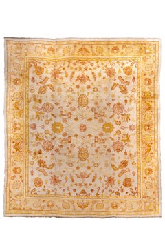 Antique Turkish Oushak with Delicate Floral Field in Soft Saffron and Ivory