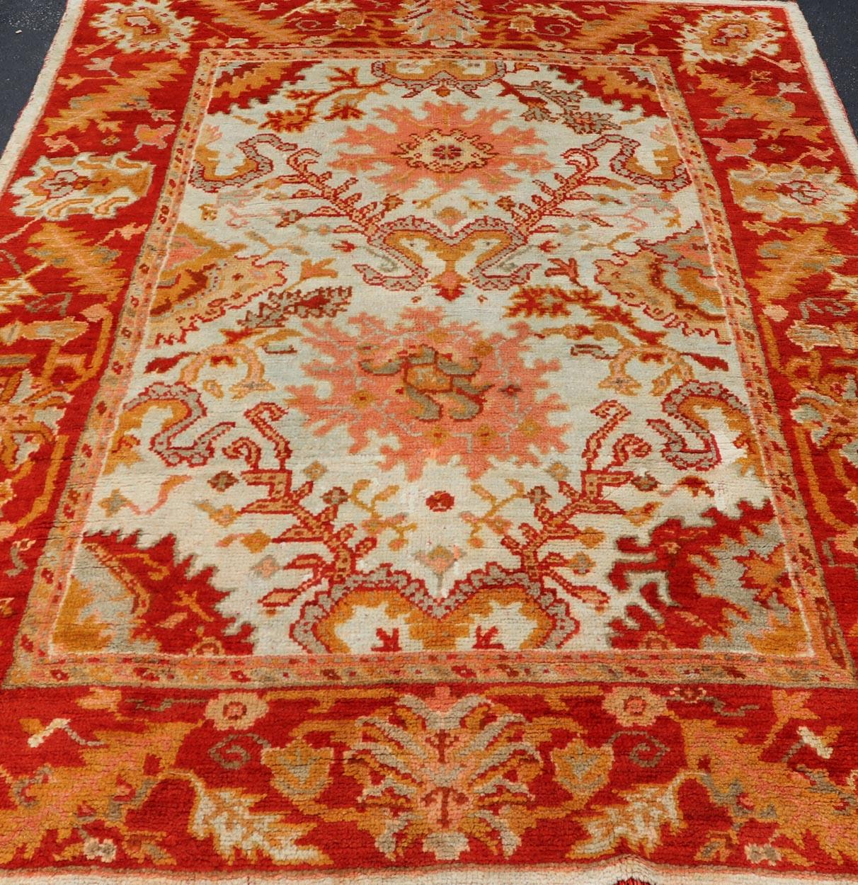 Antique Turkish Oushak with Elegant Motifs in Red, Ivory, Gold and Salmon Pink For Sale 5
