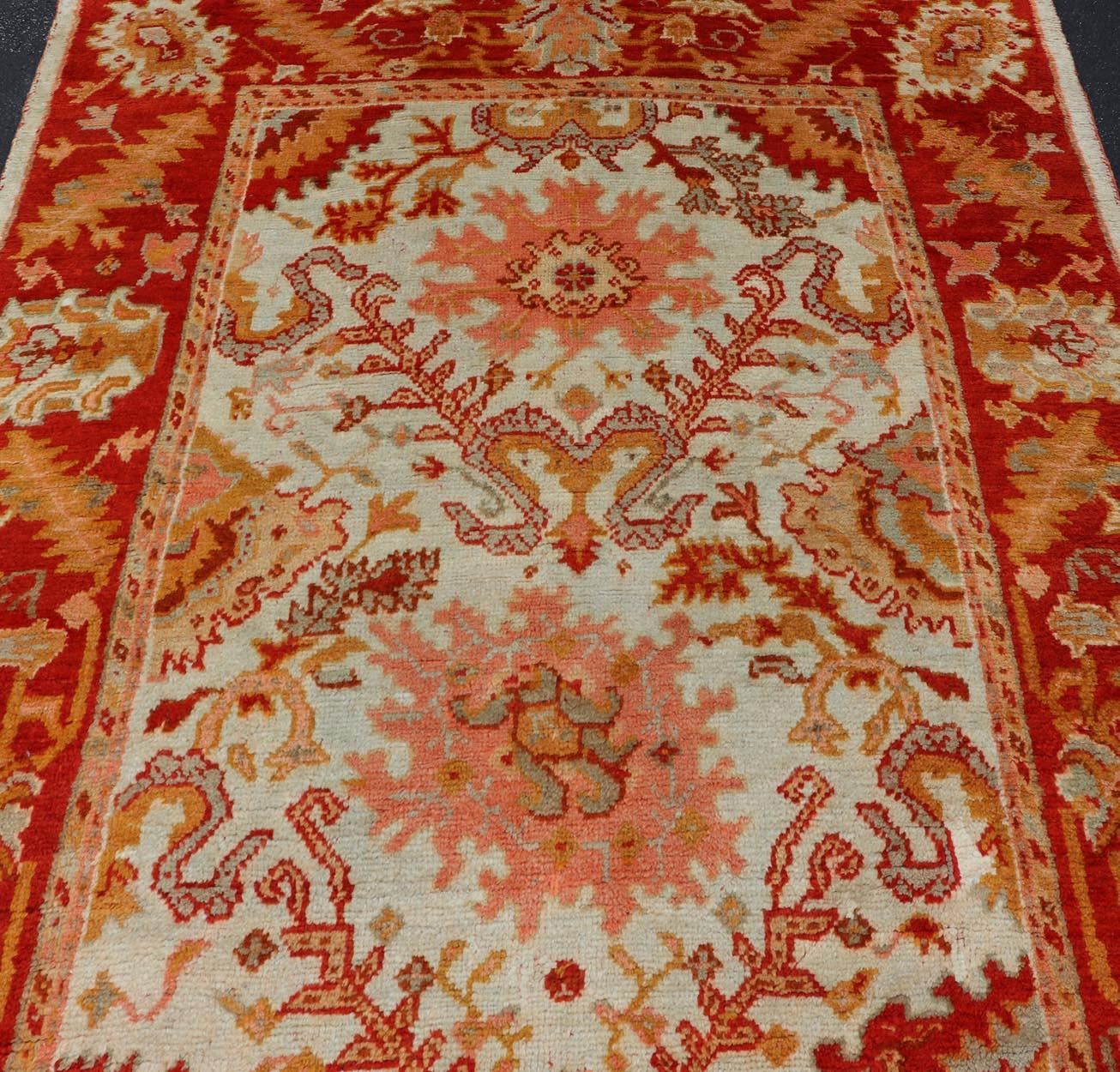 Antique Turkish Oushak with Elegant Motifs in Red, Ivory, Gold and Salmon Pink For Sale 6