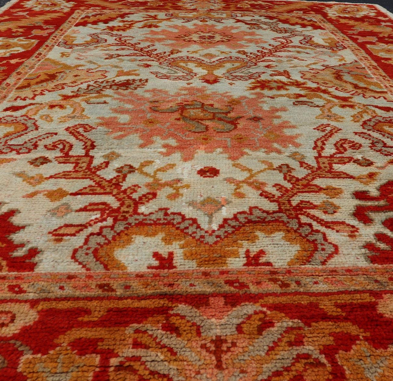 Antique Turkish Oushak with Elegant Motifs in Red, Ivory, Gold and Salmon Pink For Sale 7