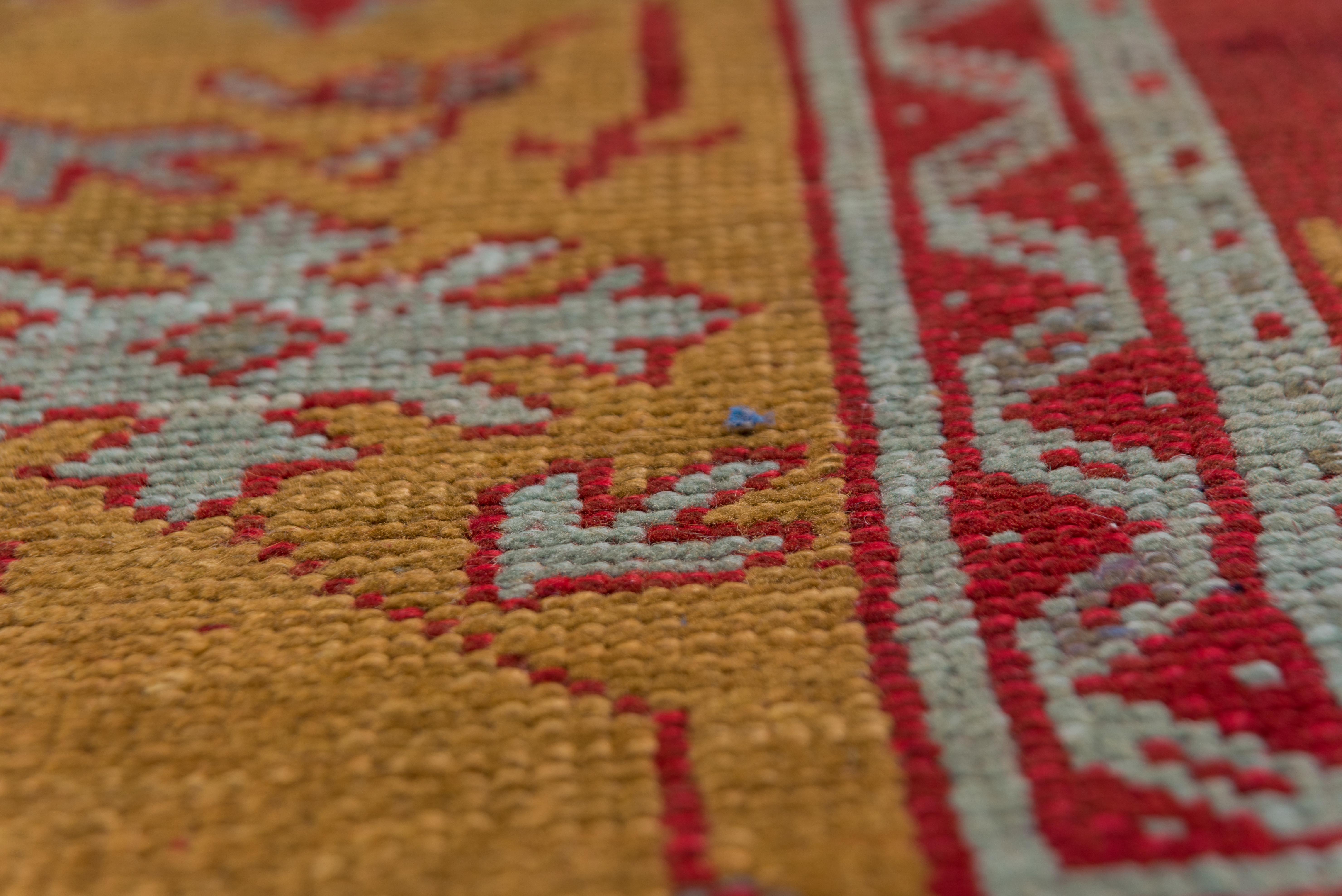Hand-Knotted Antique Turkish Red Oushak Carpet, Yellow Borders, circa 1910s For Sale