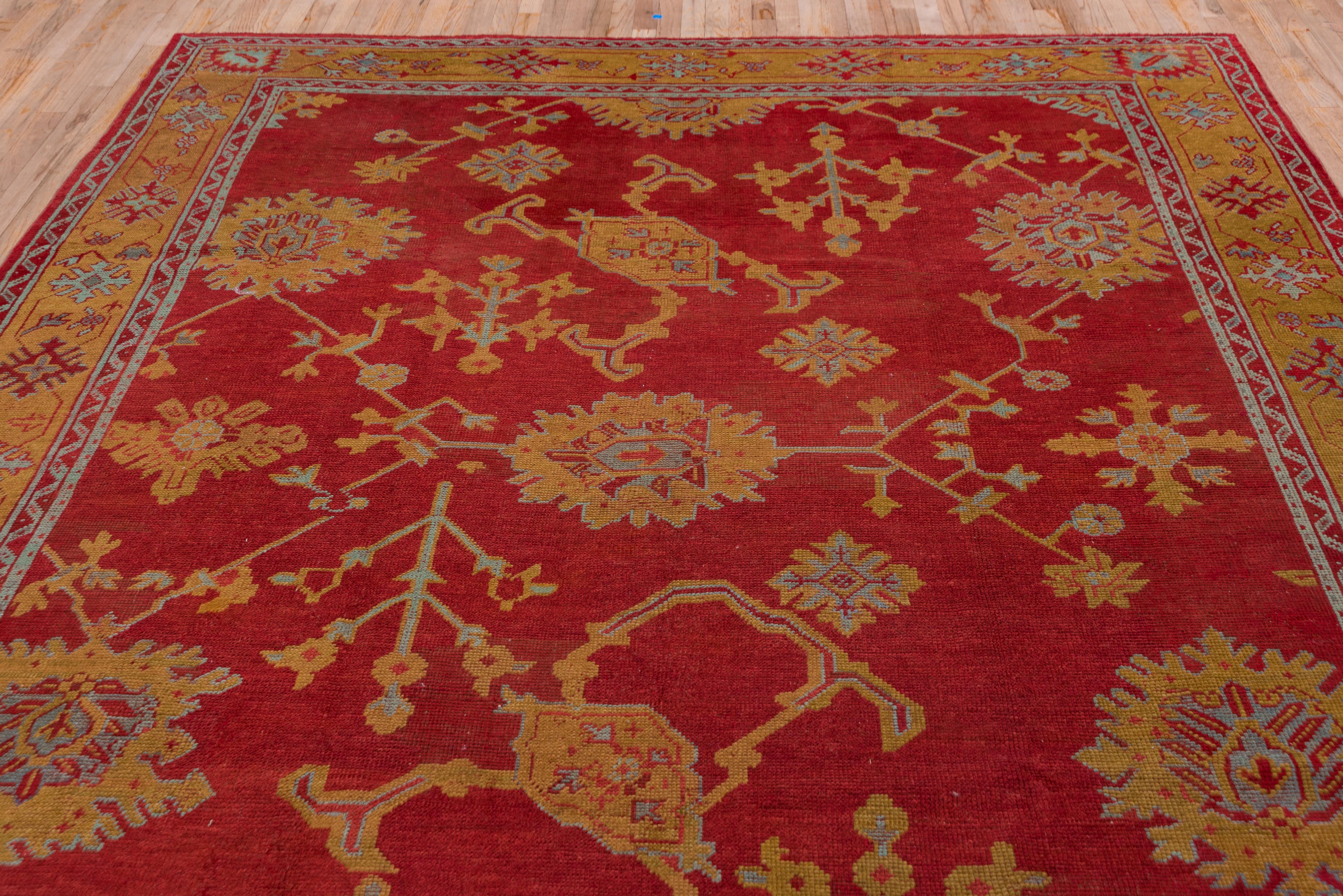 Early 20th Century Antique Turkish Red Oushak Carpet, Yellow Borders, circa 1910s For Sale