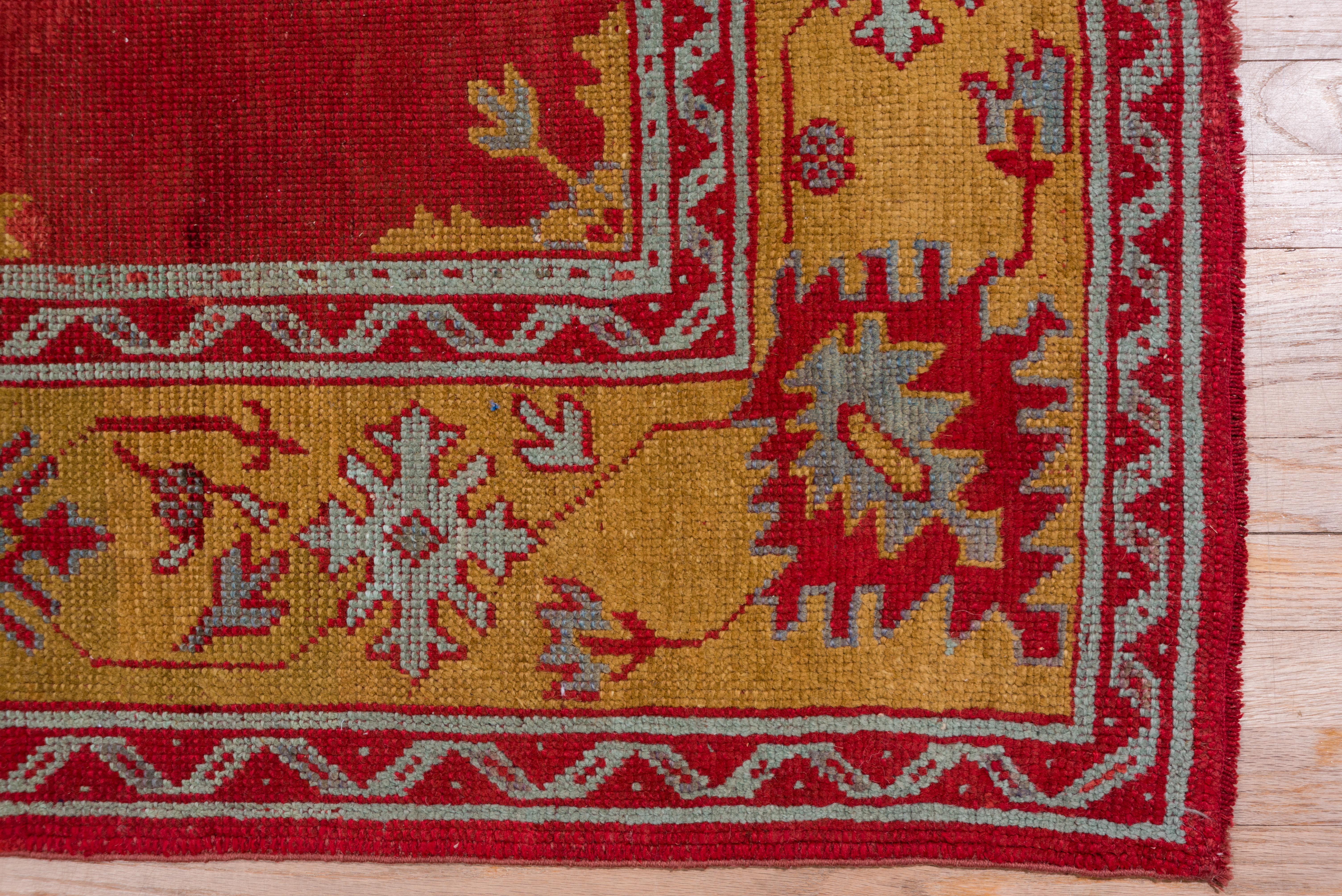 Wool Antique Turkish Red Oushak Carpet, Yellow Borders, circa 1910s For Sale
