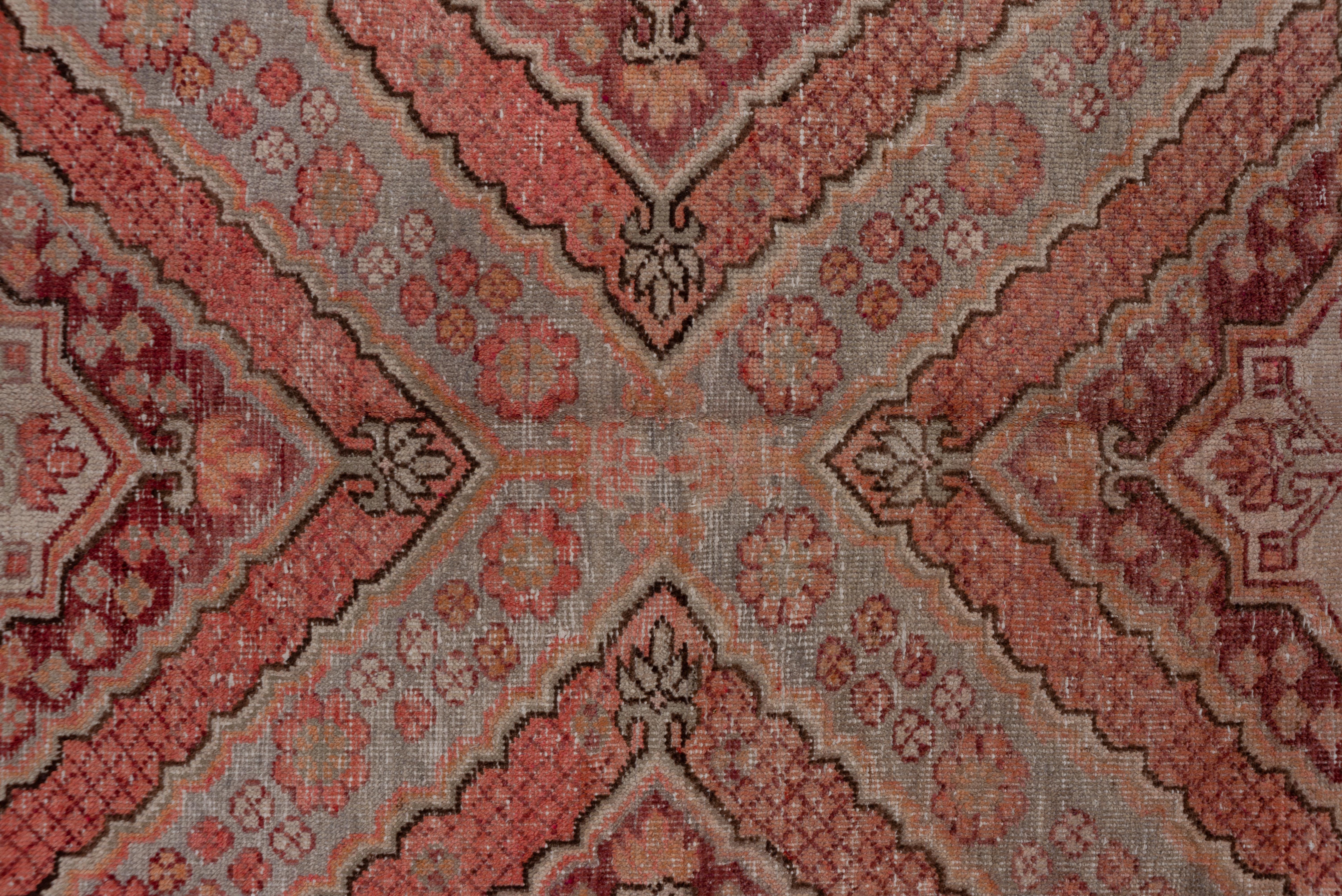 Wool Antique Khotan Rug - Red Hues, Triangular Detailing For Sale