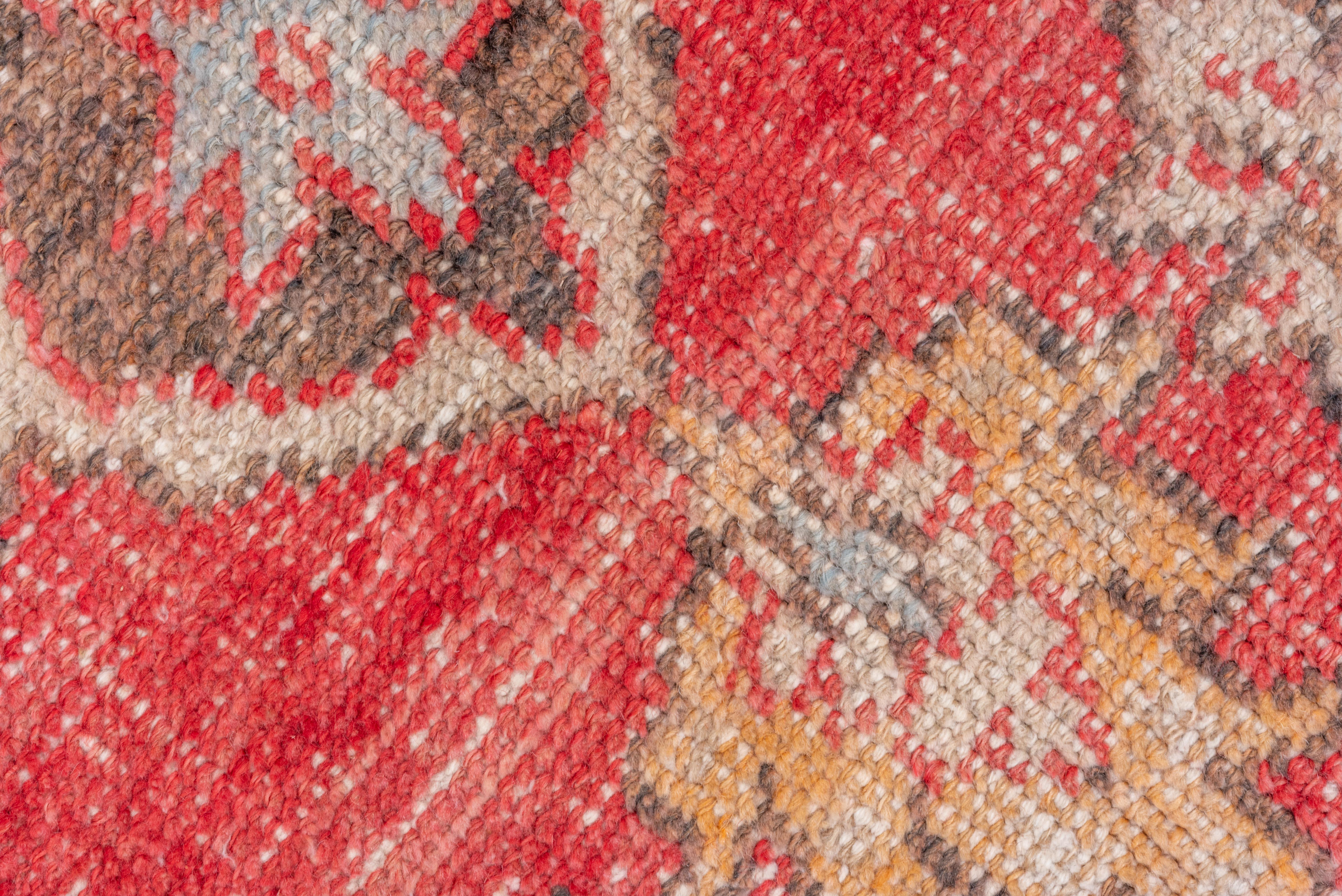 Laine Tapis turc ancien Oushak : harmonie de rouges et d'oranges au design typique en vente
