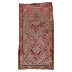 Antiker Khotan-Teppich – rote Farbtöne, dreieckige Details