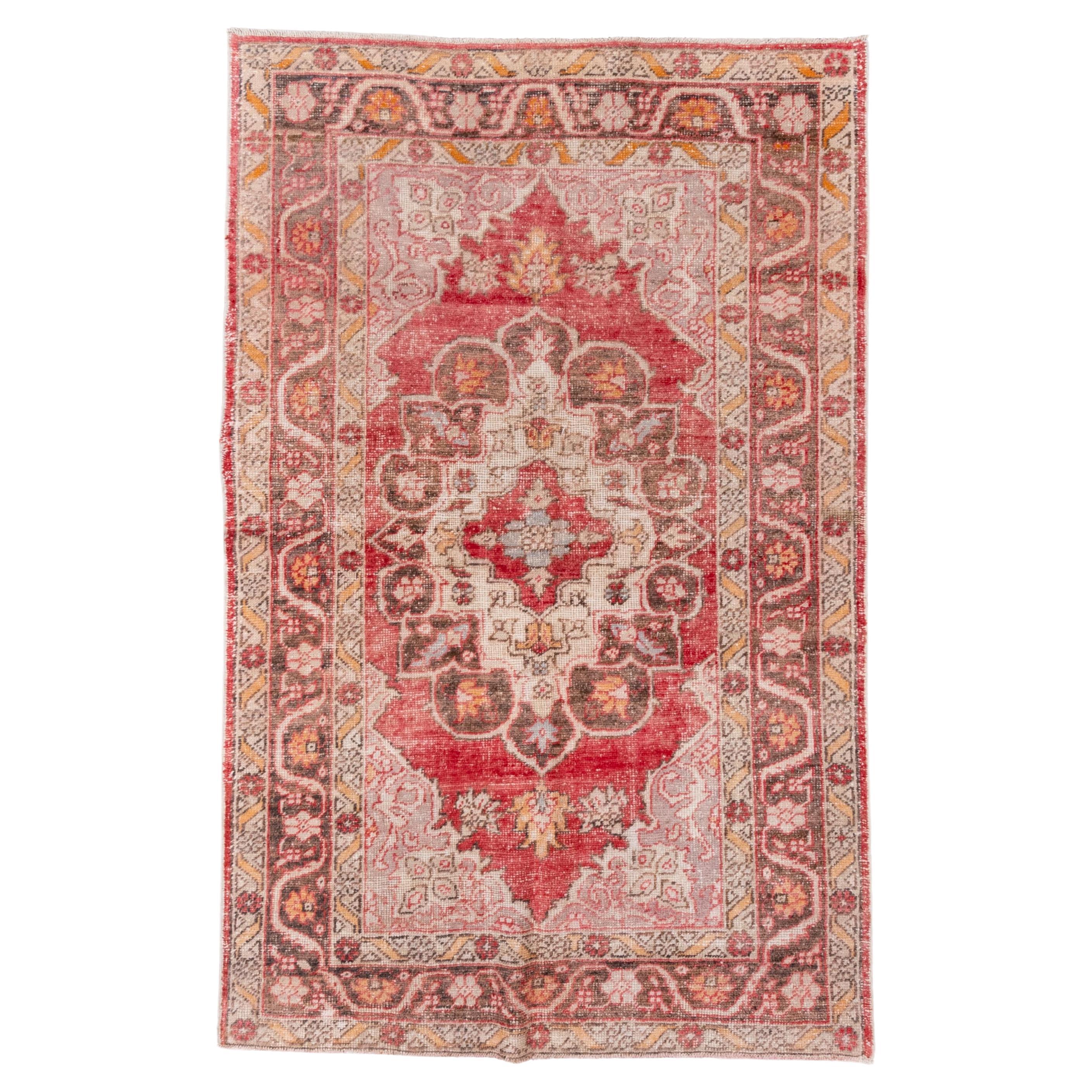 Tapis turc ancien Oushak : harmonie de rouges et d'oranges au design typique en vente