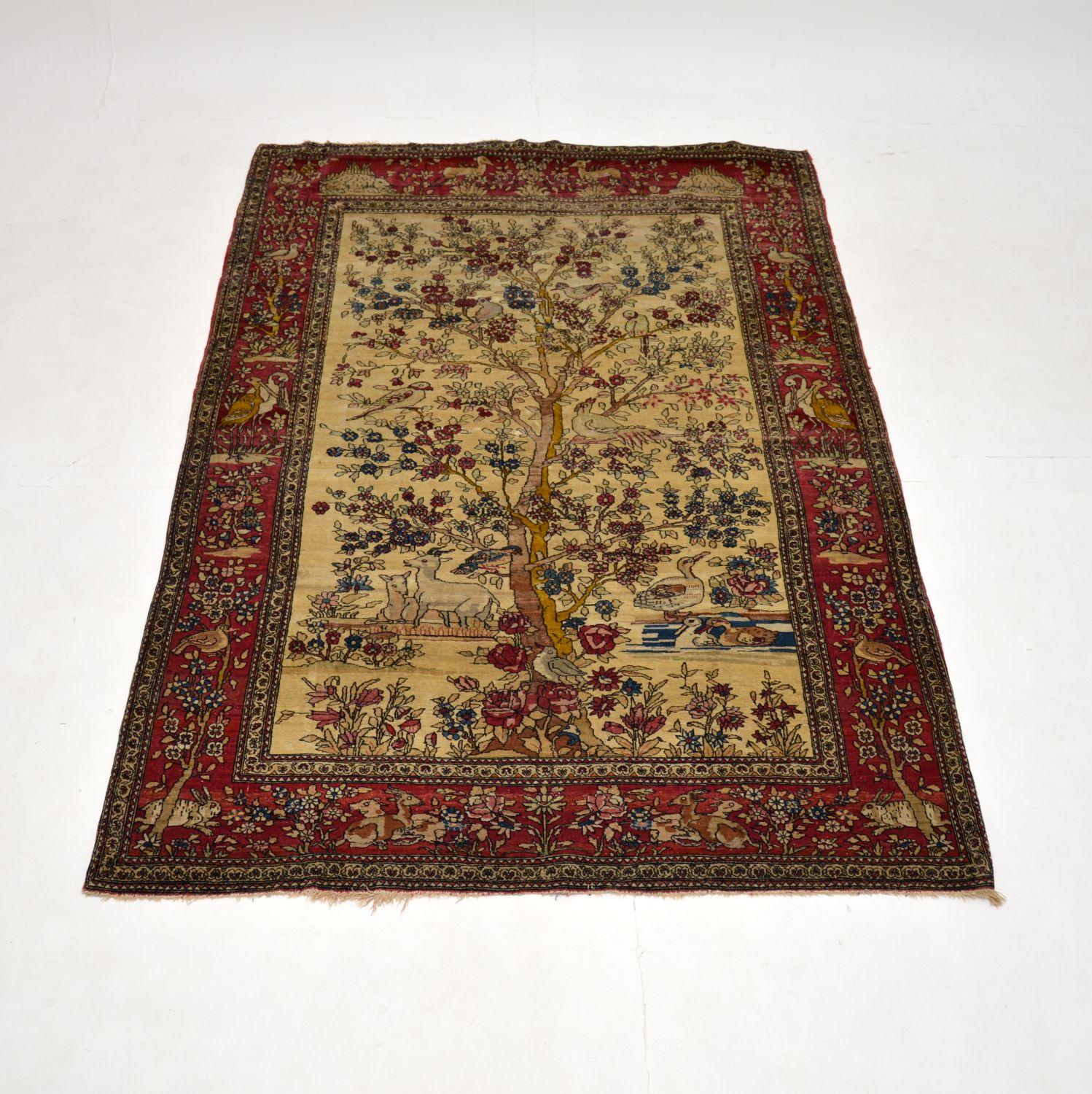 A large beautiful and very high quality antique Turkish rug, dating from around the 1890-1910 period.

It depicts a gorgeous scene of a large tree and various animals, with wonderful patterned borders.

It is in good condition for its age, with