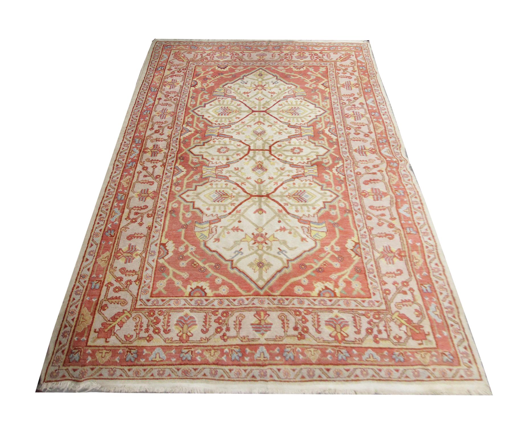 The bold geometric print and subtle pastel colors are woven into this hand knotted wool area rug work together creating a truly beautiful look. This antique Turkish rug features an abstract pattern and asymmetrical centrepiece. The softer pallet and