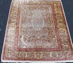 Antique Turkish Silk Hereke Rug with Floral Medallion Design and Ivory Field