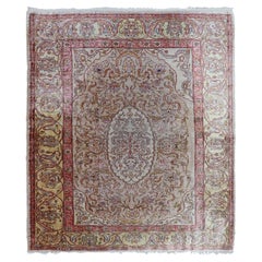 Antique Turkish Silk Hereke Rug with Floral Medallion Design and Ivory Field