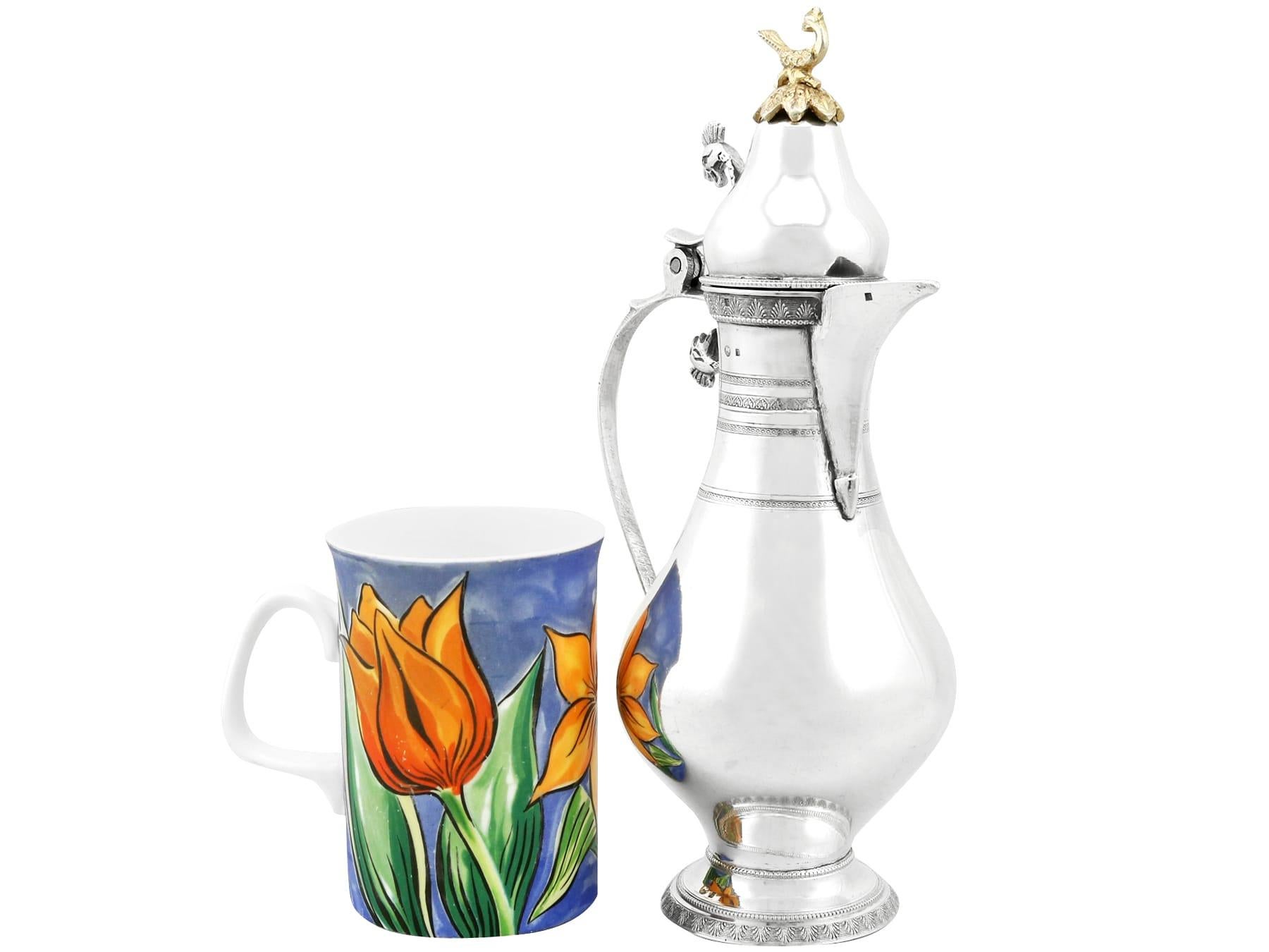 An exceptional, fine and impressive antique Turkish silver coffee jug; an addition to our silver teaware collection.

This exceptional antique Turkish silver coffee jug has a baluster shaped form to a circular spreading foot.

The surface of this