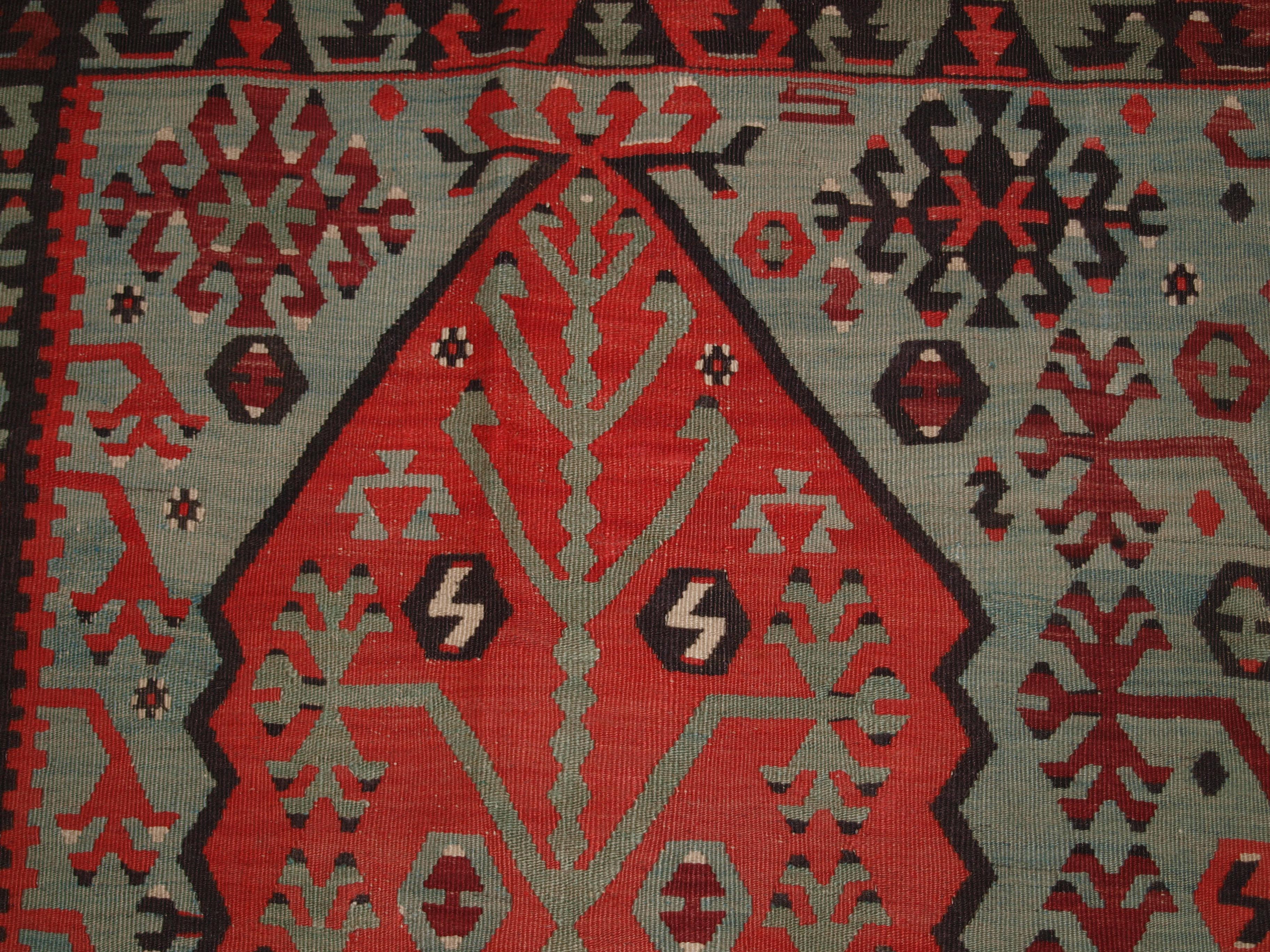 Wool Antique Turkish Sivas Kilim of Rare Design For Sale