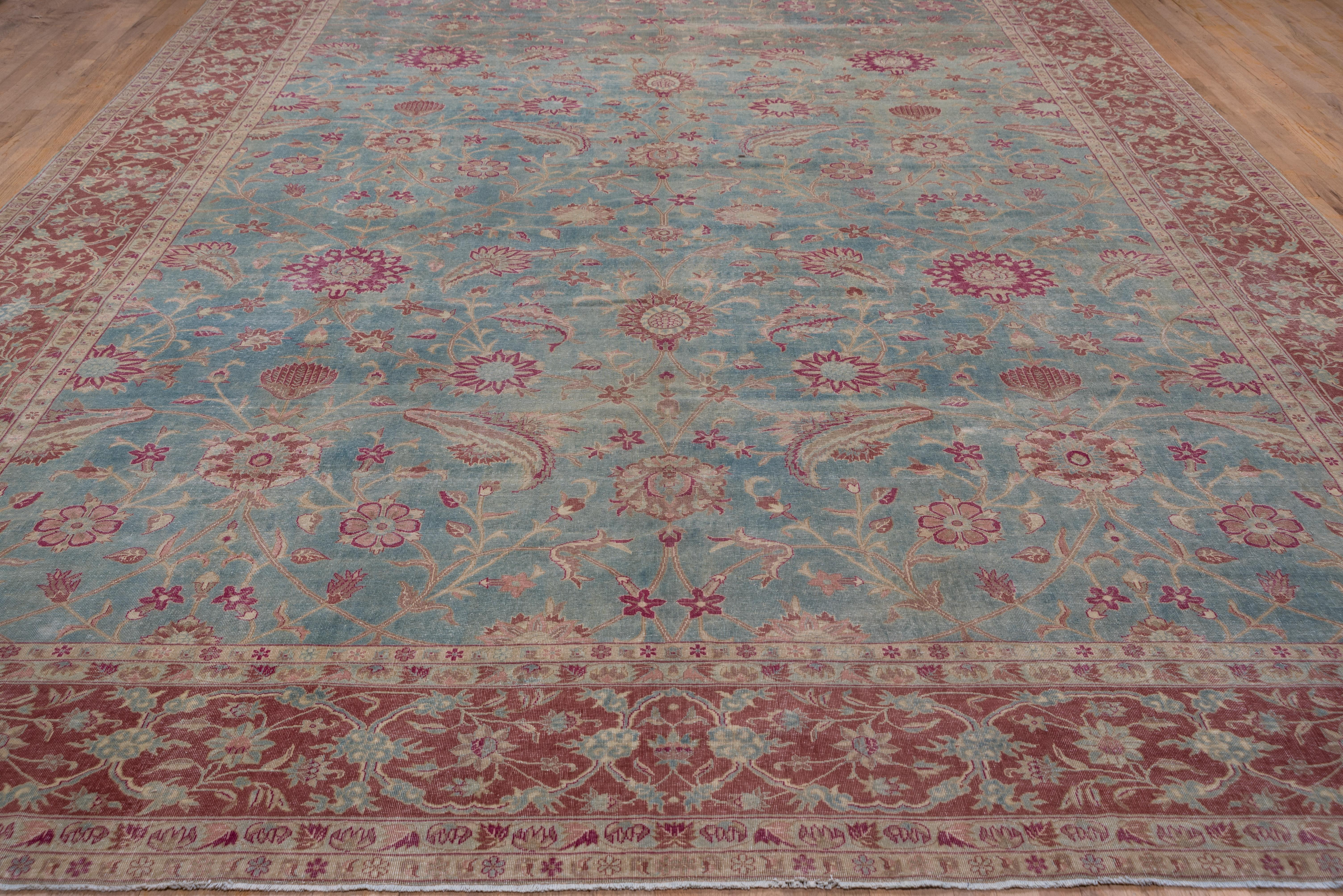 Hand-Knotted Antique Turkish Sivas Rug, Allover Blue Floral Field, Red Borders, Circa 1920s For Sale
