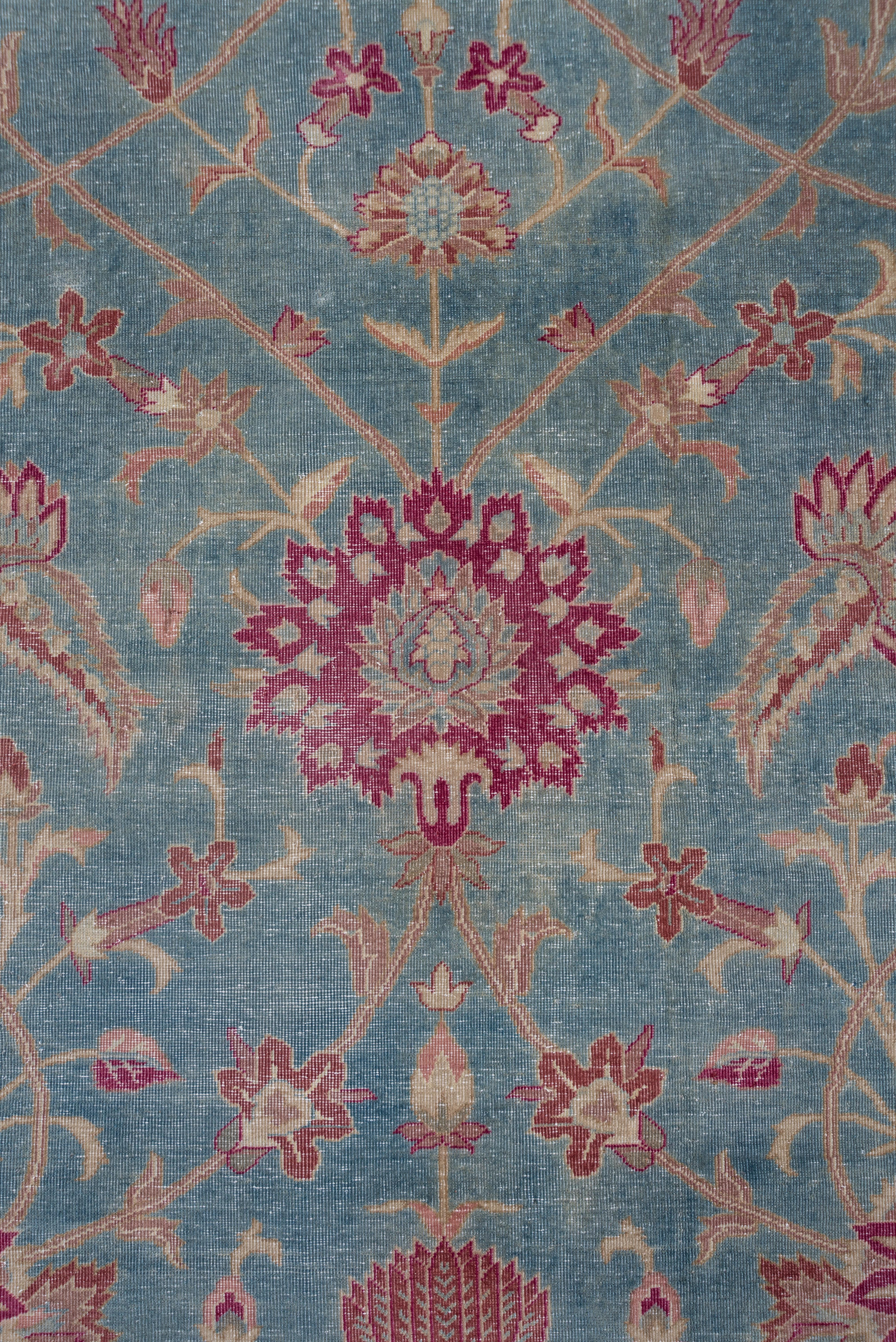 Wool Antique Turkish Sivas Rug, Allover Blue Floral Field, Red Borders, Circa 1920s For Sale